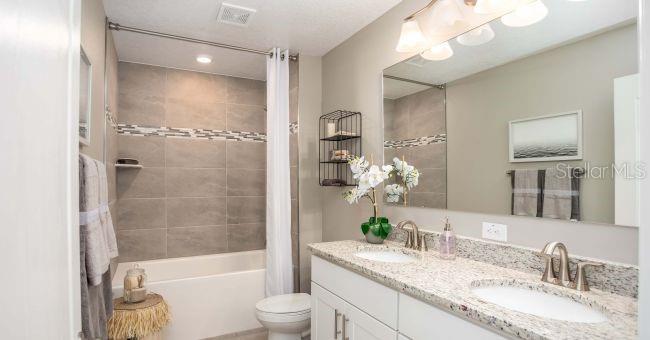Model home - actual features may vary. - 57 ENCLAVE AVE, PALM COAST