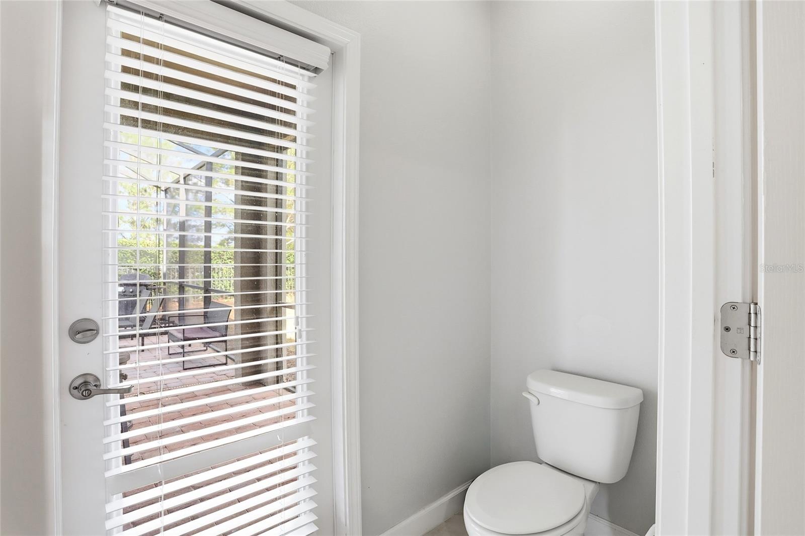 bathroom #2 leads to pool - 9039 SHADOW MOUNTAIN ST, DAVENPORT