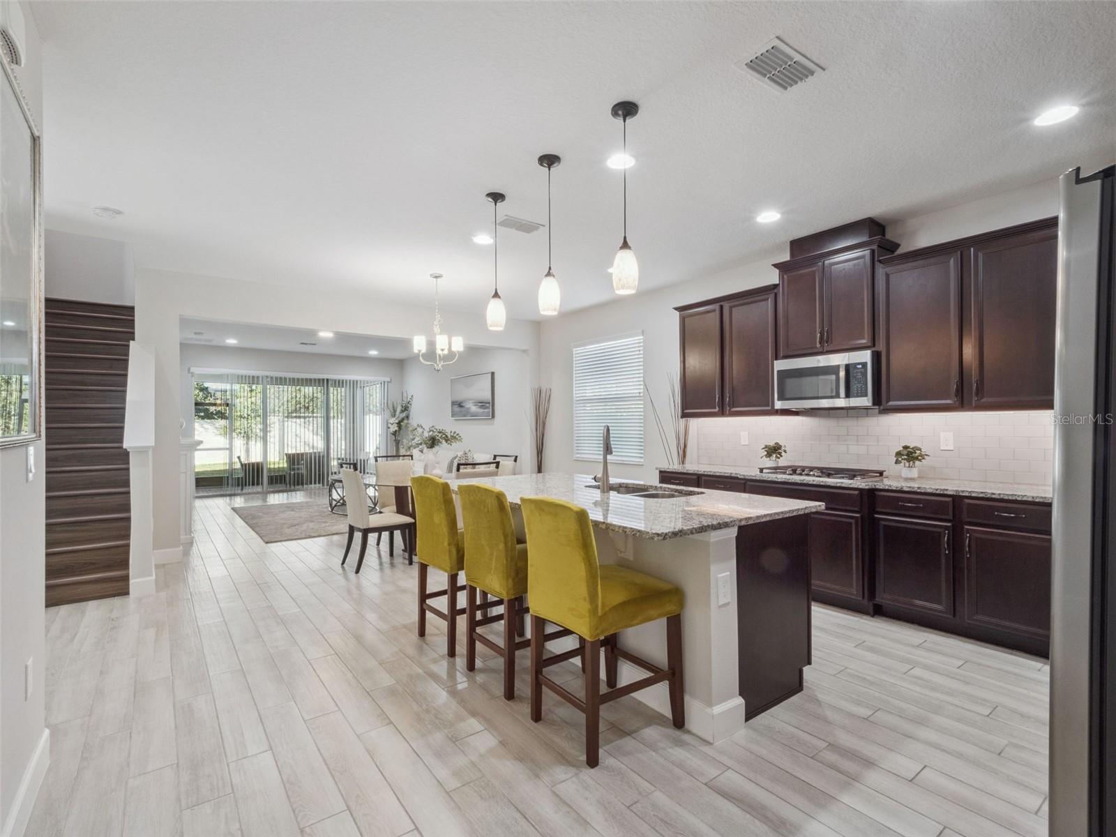 Beyond Foyer - Kitchen, Dining, Living - 14345 WABASSO LOOP, WINTER GARDEN