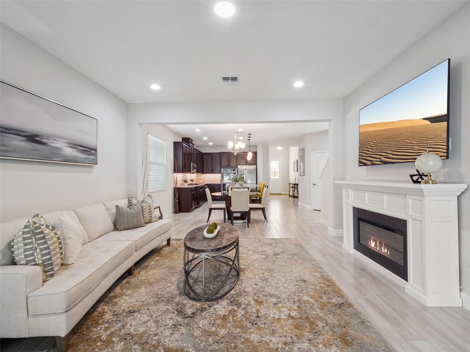 Living Room to Dining + Kitchen - 14345 WABASSO LOOP, WINTER GARDEN