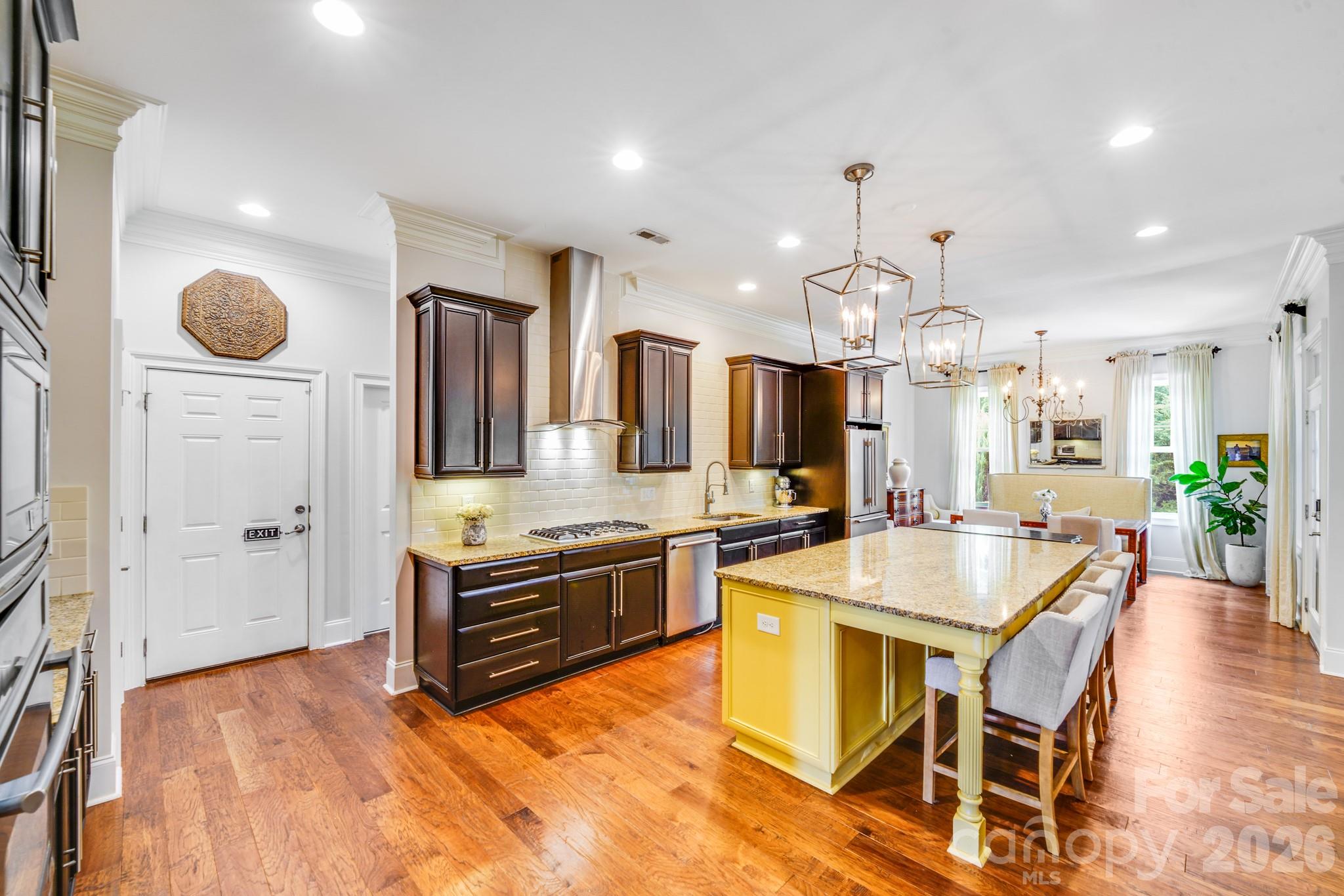 Home features a magazine-worthy gourmet kitchen and dining area with high-end finishes and thoughtful design - 2702 Arsdale Road, Waxhaw