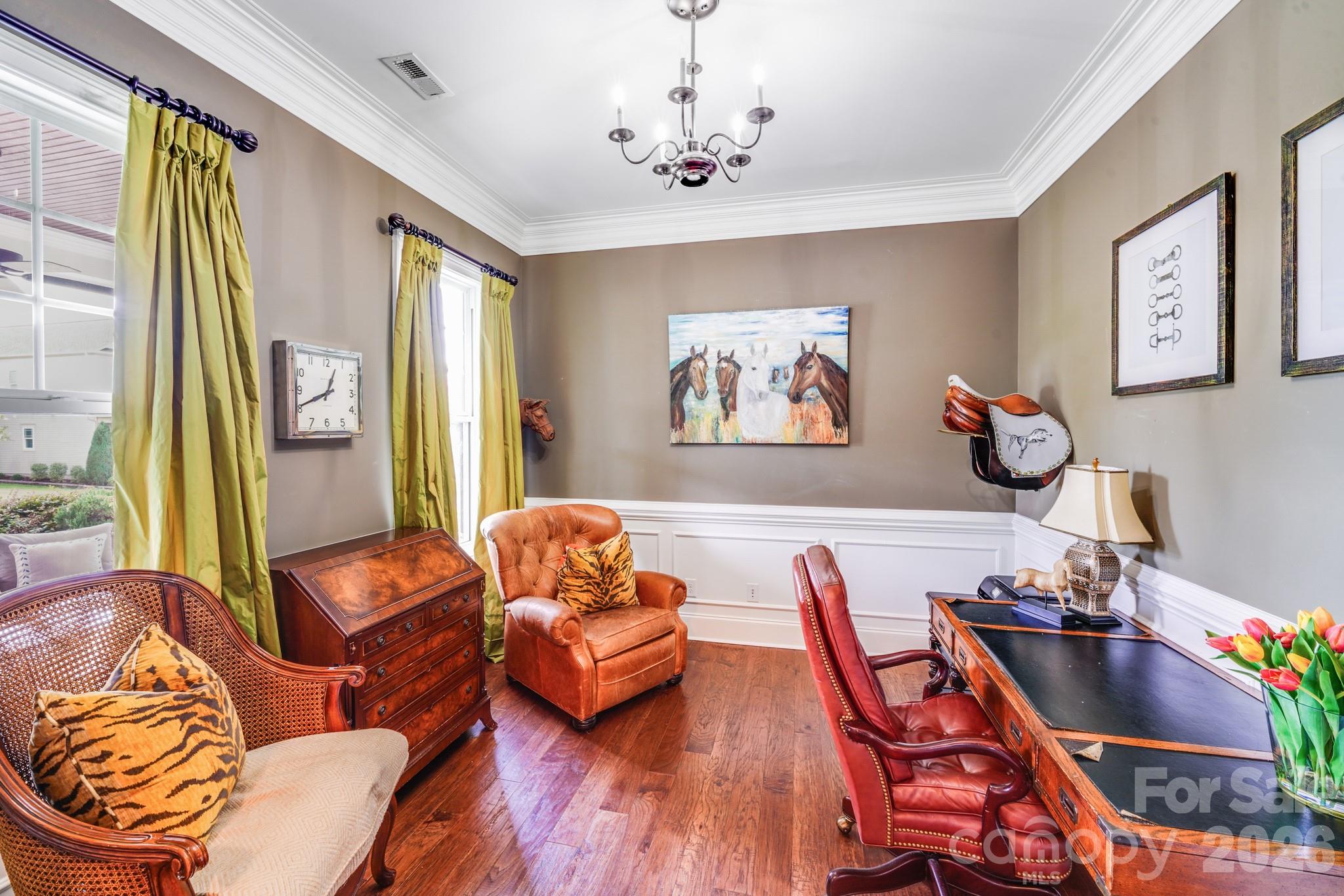 This room features double French doors for added privacy, making it ideal for a study, private home office, or reading retreat - 2702 Arsdale Road, Waxhaw