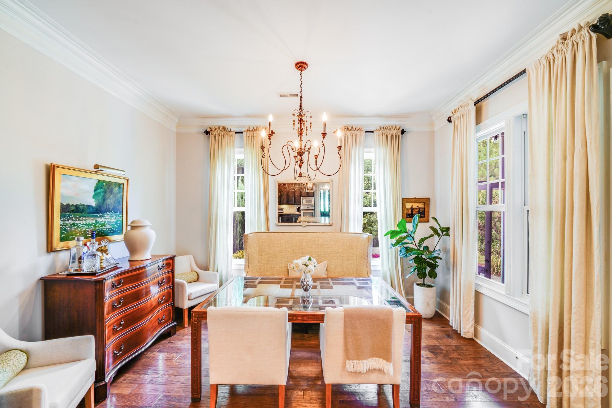 This elegant dining room exudes timeless style and warmth—ideal for hosting dinner parties or enjoying everyday meals in comfort. - 2702 Arsdale Road, Waxhaw