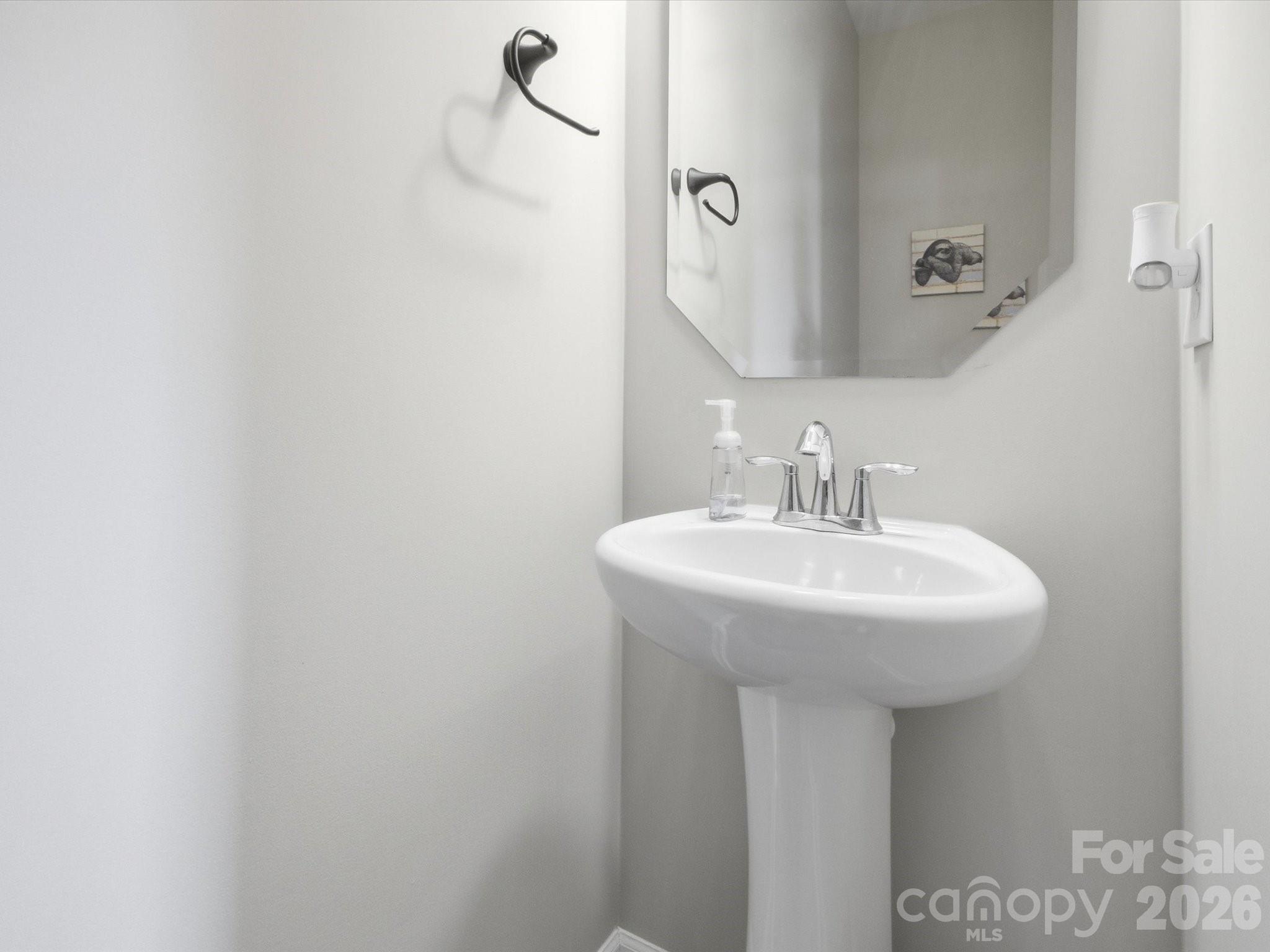 Downstairs half-bathroom/Powder room - 1049 River Haven Avenue SW, Concord