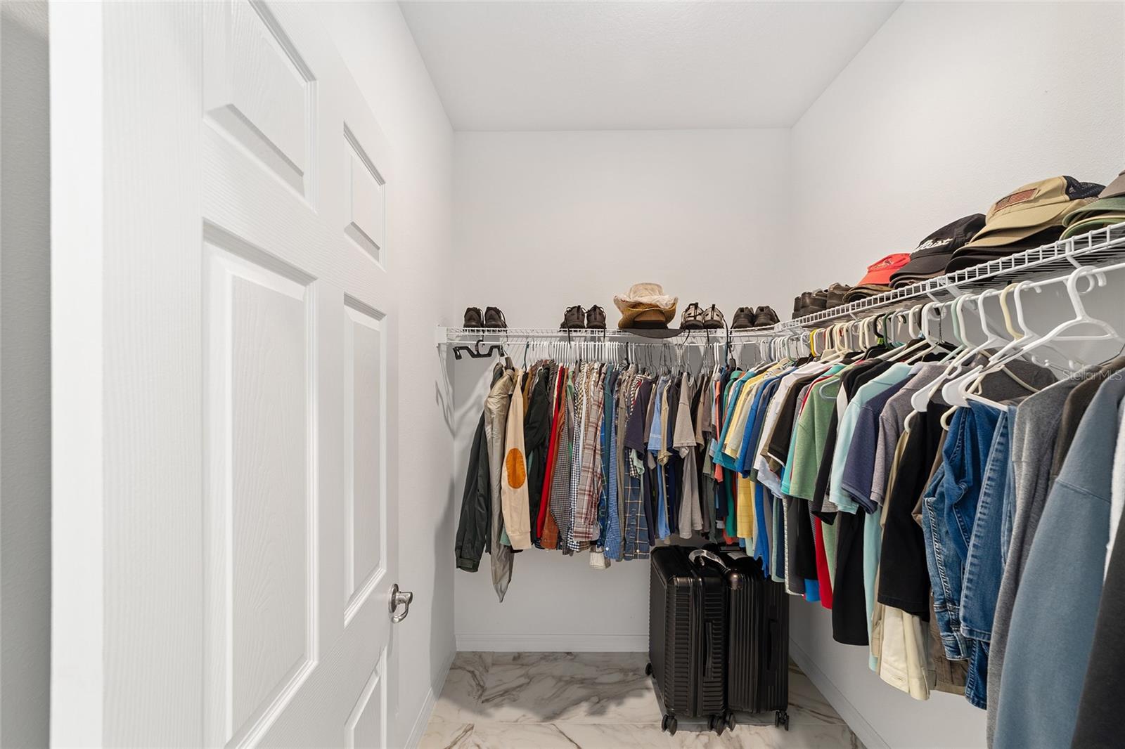 His closet - 7037 SW 86TH AVE, OCALA