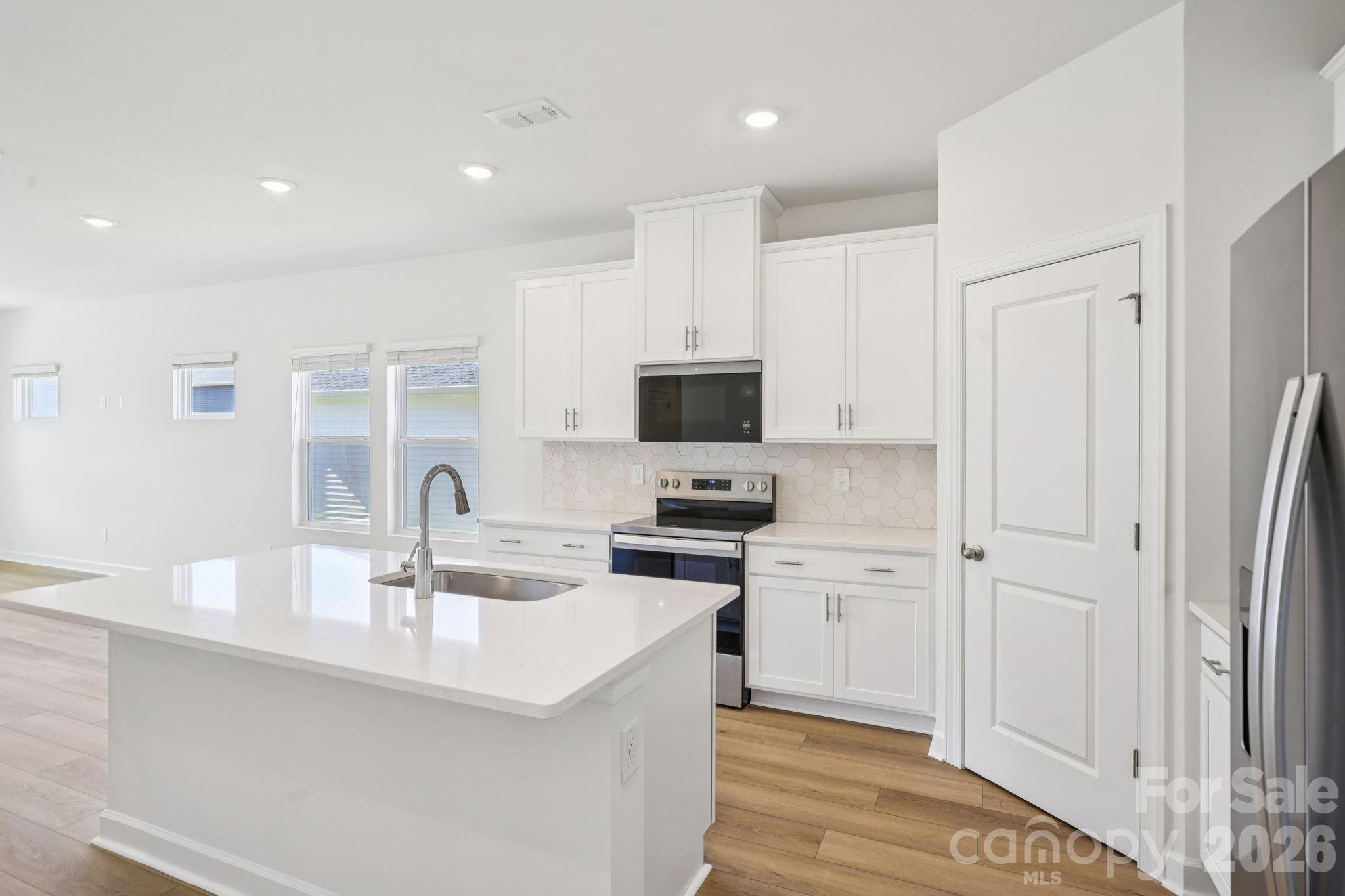 Photo is not of the actual home but is an inspirational photo of builder’s model home and may depict options, furnishings, and/or decorator features that are not included. - 1419 Blue Jay Street, Newton