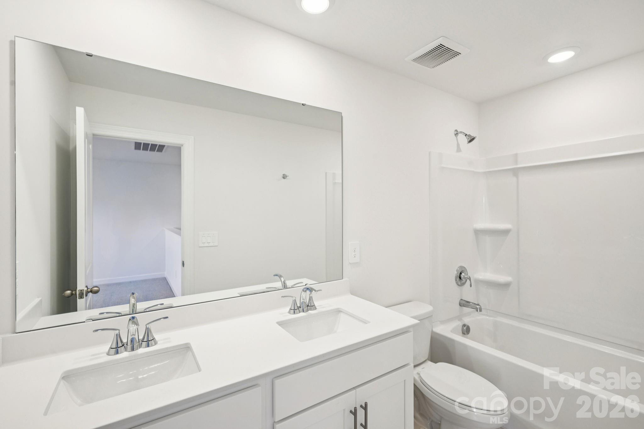 Photo is not of the actual home but is an inspirational photo of builder’s model home and may depict options, furnishings, and/or decorator features that are not included. - 1419 Blue Jay Street, Newton