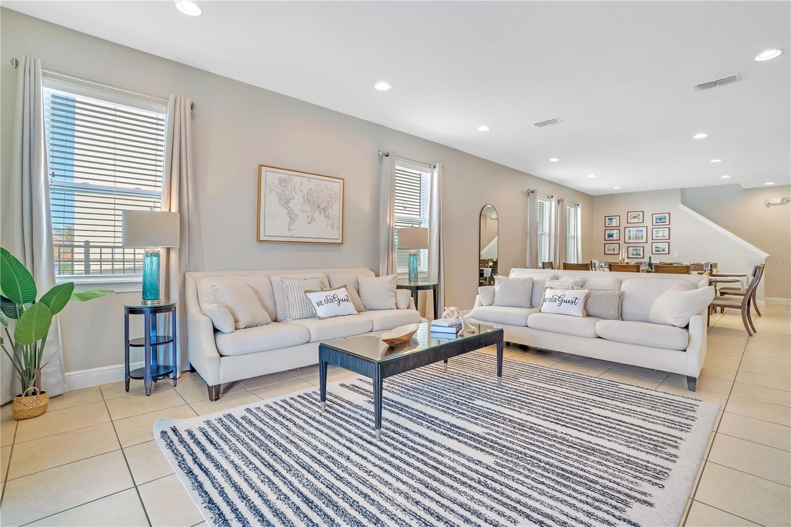 Generous living area with abundant seating and natural light - 631 LASSO DR, KISSIMMEE