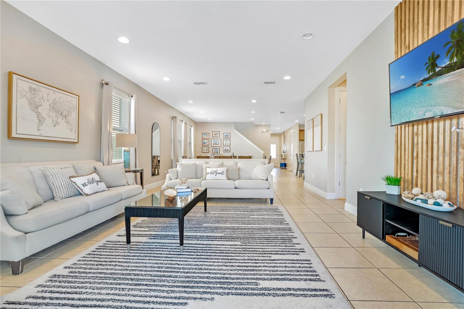 Open and inviting main living space designed for relaxation after a day of adventure - 631 LASSO DR, KISSIMMEE