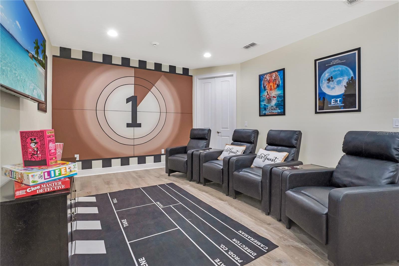 Private theater room with seating perfect for movie nights after the parks. - 631 LASSO DR, KISSIMMEE