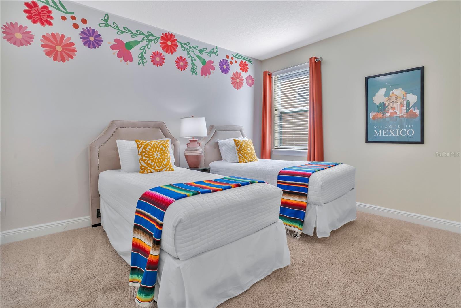 Welcome to The 'Riveria Maya' Suite - Vibrant Riviera-inspired suite featuring colorful floral accents and cheerful design details - 631 LASSO DR, KISSIMMEE