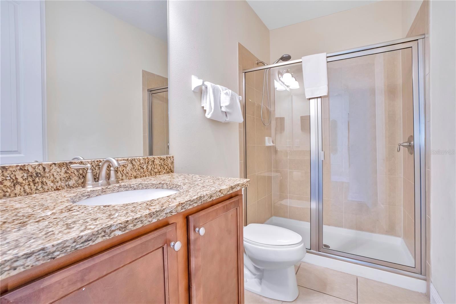 Ensuite bathroom to the "Magic Kingdom" Suite! - 631 LASSO DR, KISSIMMEE