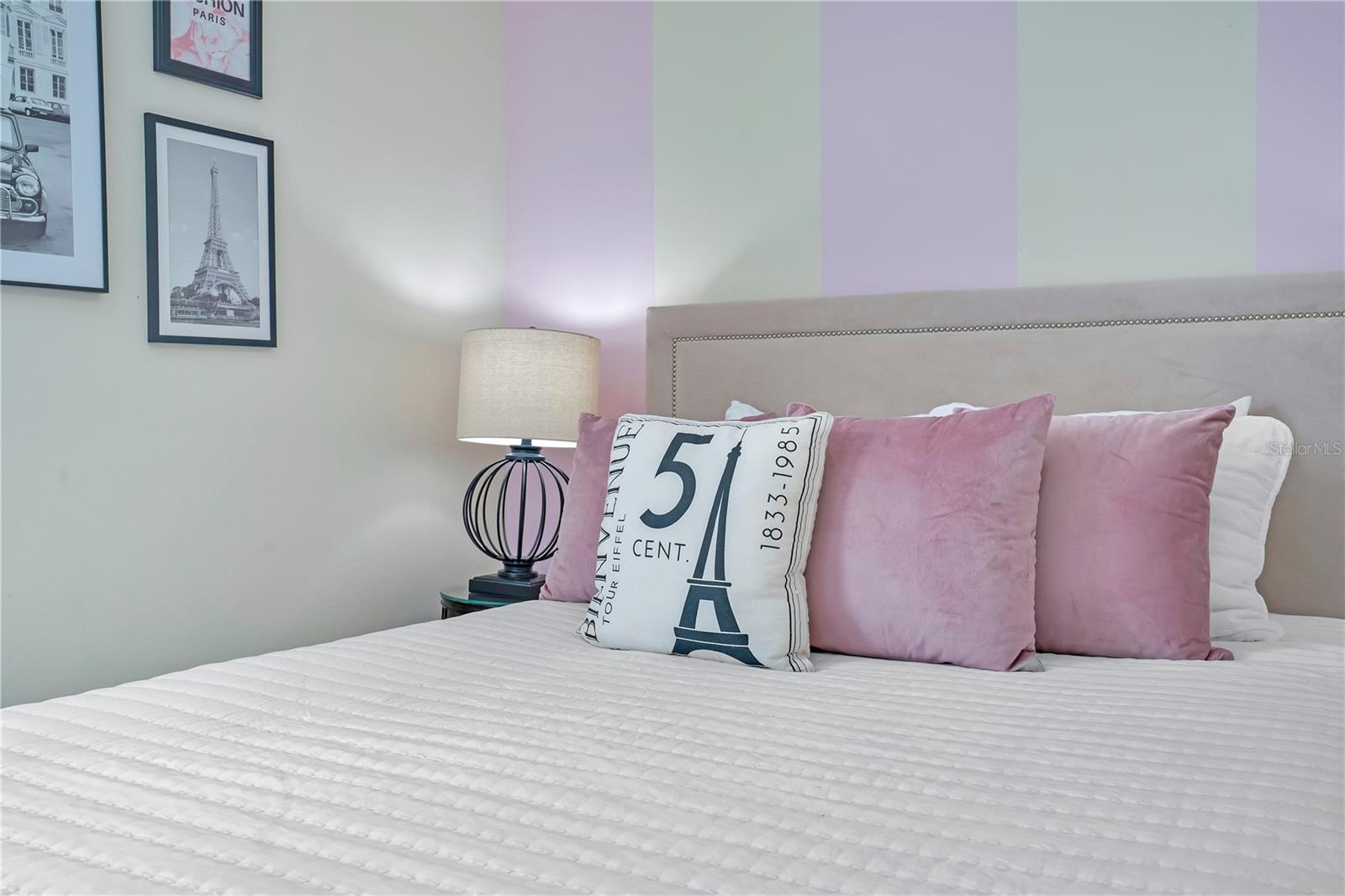 Paris-inspired bedroom showcasing chic design elements and refined European flair - 631 LASSO DR, KISSIMMEE