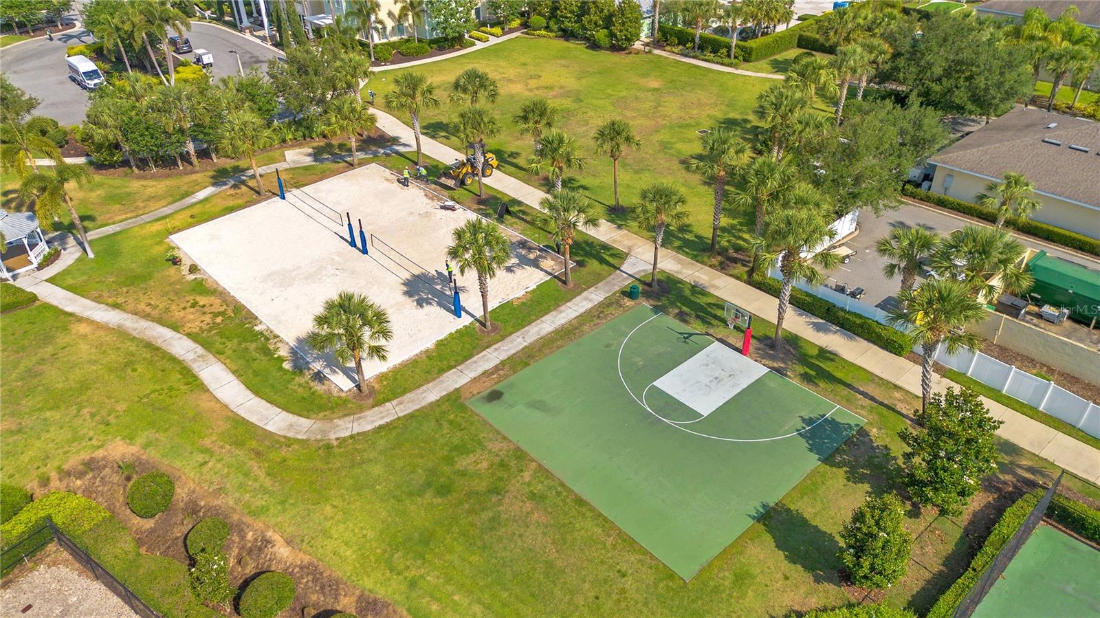 Sports courts and green space providing additional entertainment options within the resort - 631 LASSO DR, KISSIMMEE