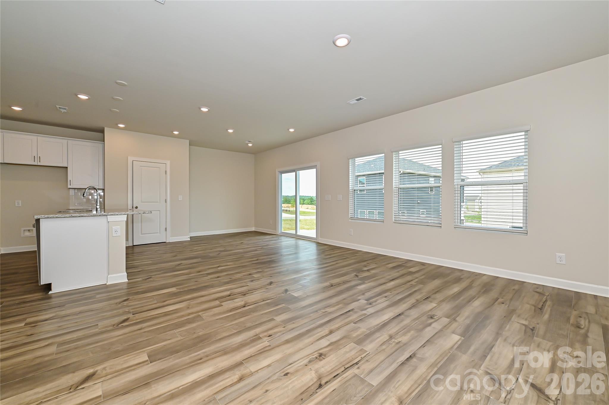Photo is not of the actual home, but is an inspirational photo of builder’s model home and may depict options, furnishings, and/or decorator features that are not included - 1436 Wildflower Street, Newton