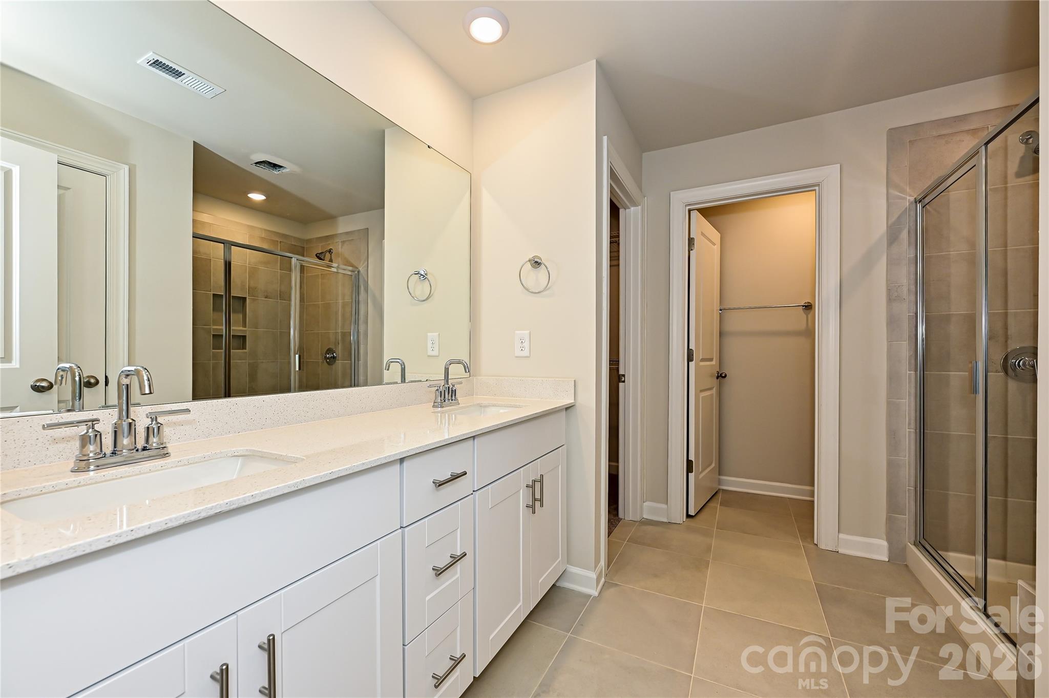 Photo is not of the actual home, but is an inspirational photo of builder’s model home and may depict options, furnishings, and/or decorator features that are not included - 1436 Wildflower Street, Newton