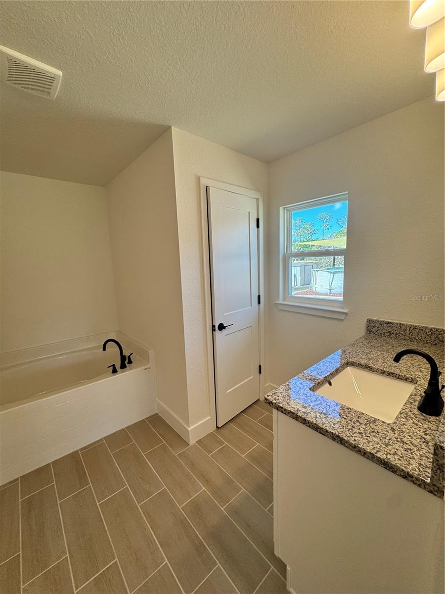 Single Family Residence at 7933 TROPICAIRE BLVD., NORTH PORT, photo 9 of 14