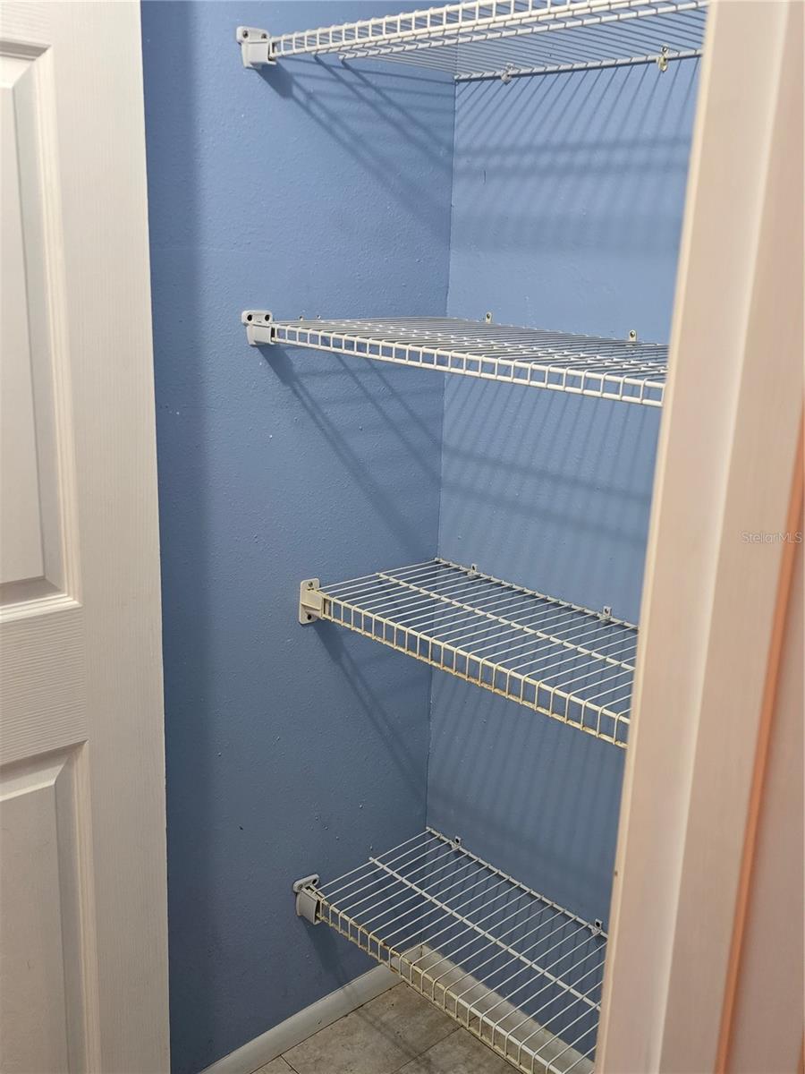 2nd Bathroom linen closet - 4140 PASSPORT LN #101, NEW PORT RICHEY