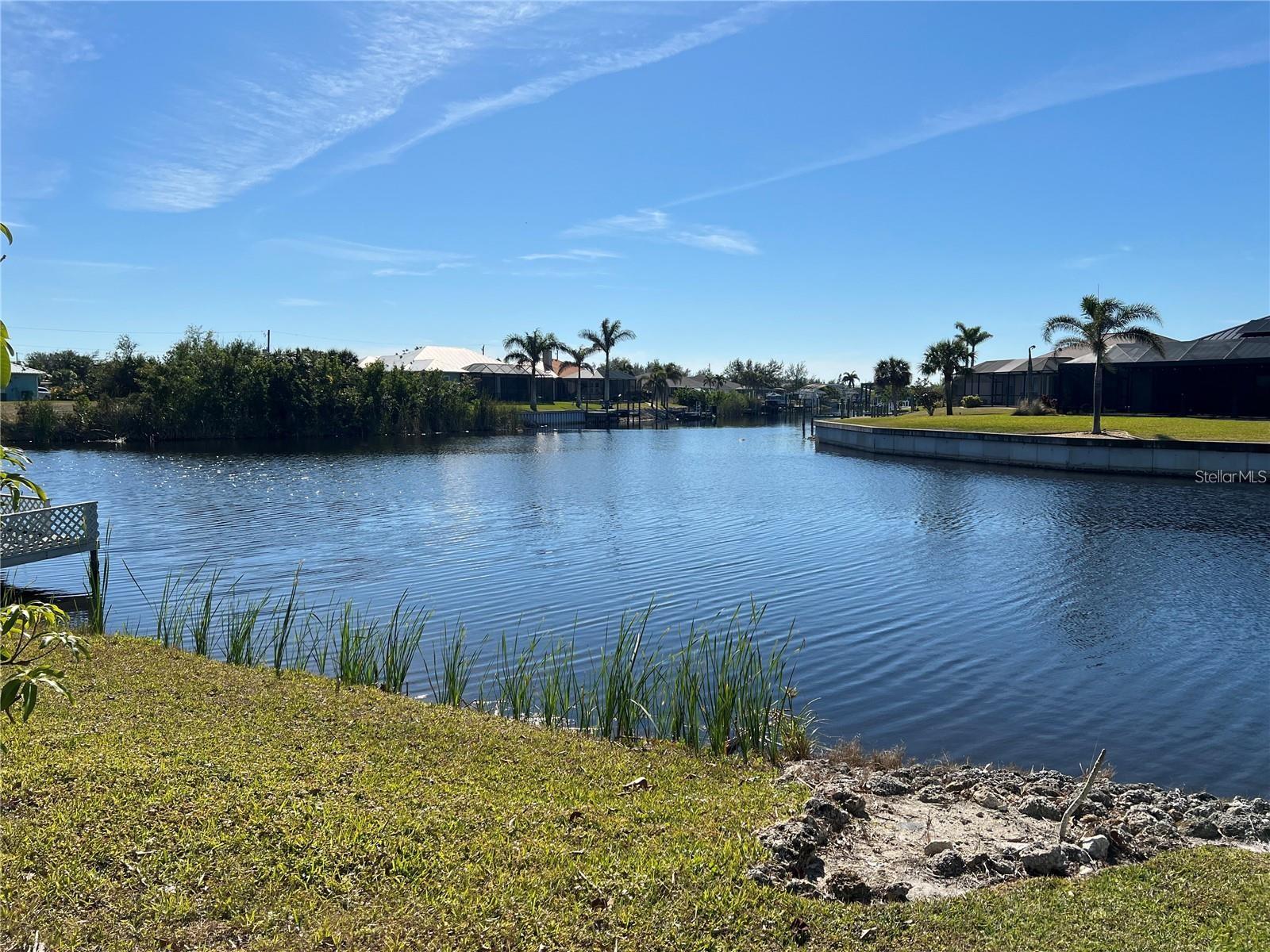 Waterfront View109.49 feet of Waterfront - 9458 MELODY CIR, PORT CHARLOTTE