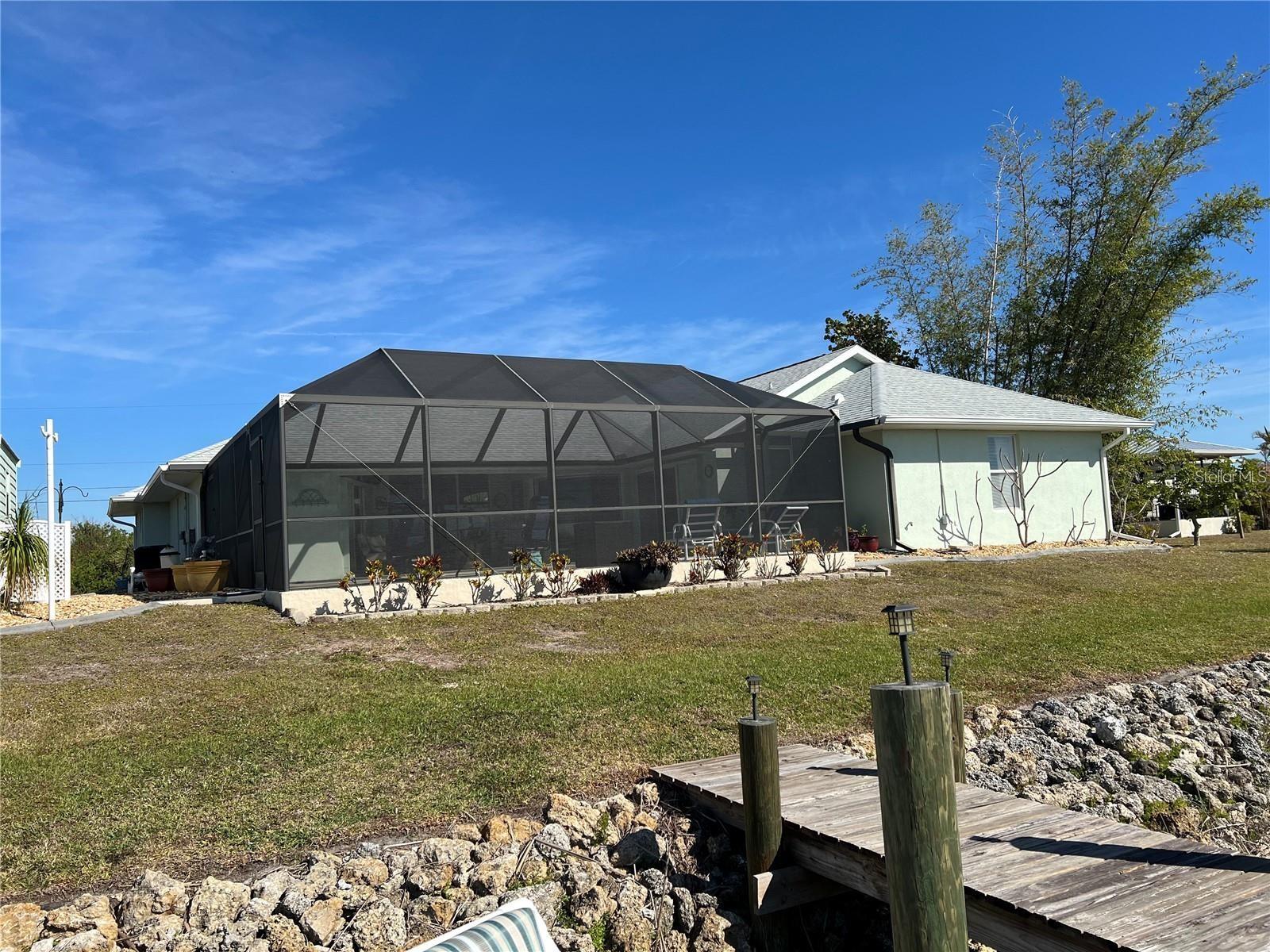 Rear View of Home - 9458 MELODY CIR, PORT CHARLOTTE