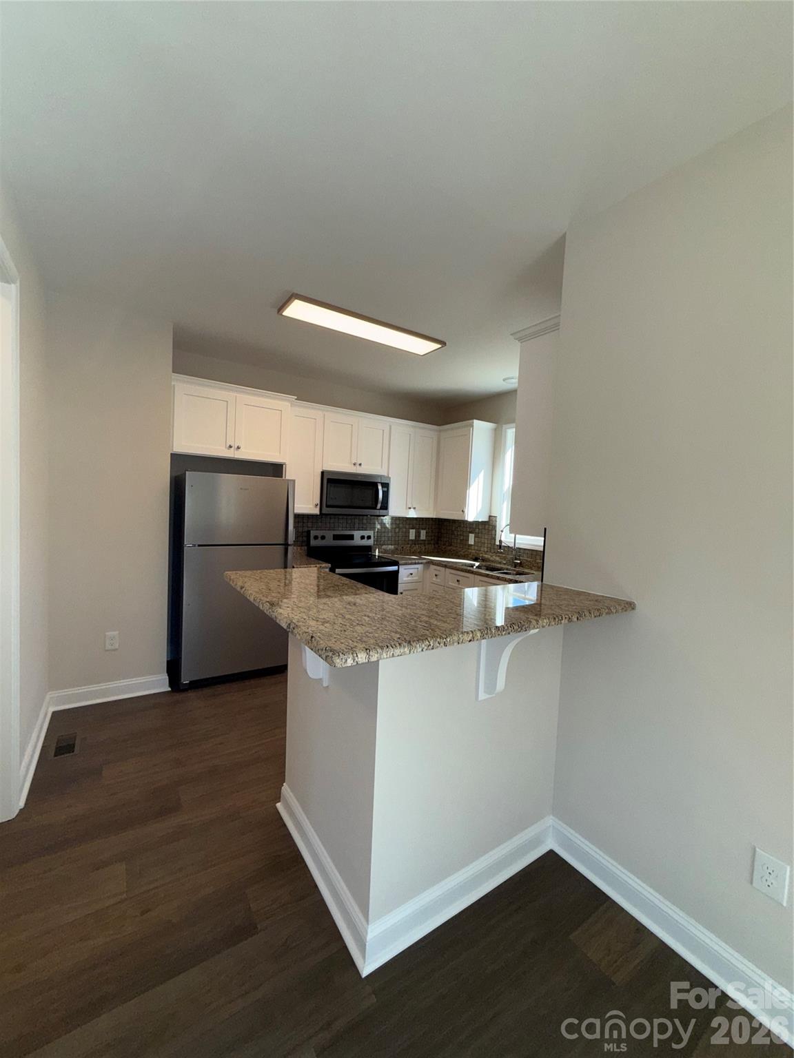 Single Family Residence at 449 Cabarrus Avenue W, Concord, photo 8 of 25
