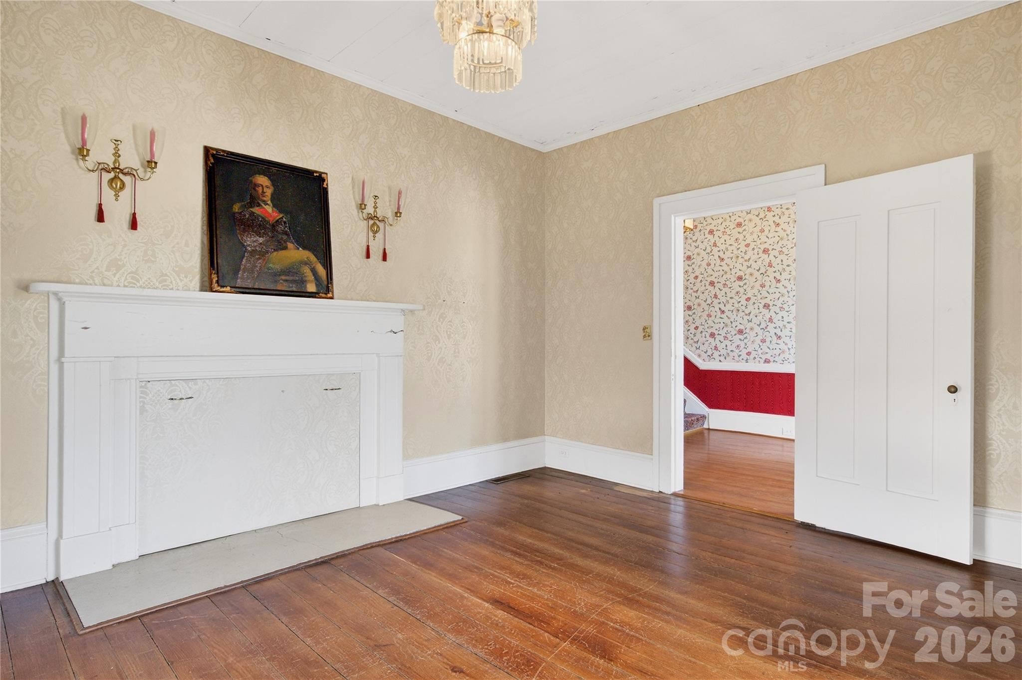 Front parlor with heart pine floors and historic mantlepiece - 11124 Eastfield Road, Huntersville