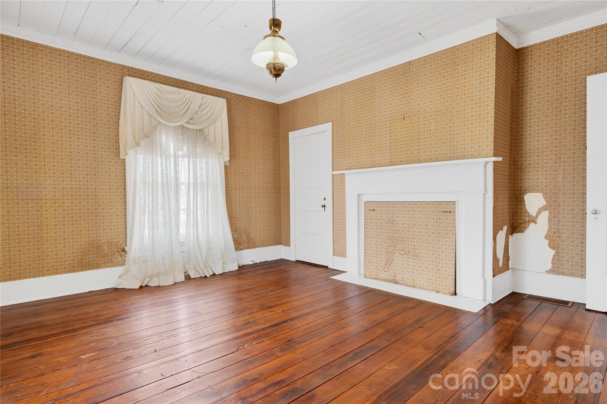 NE Bedroom upstairs has pine floors - 11124 Eastfield Road, Huntersville