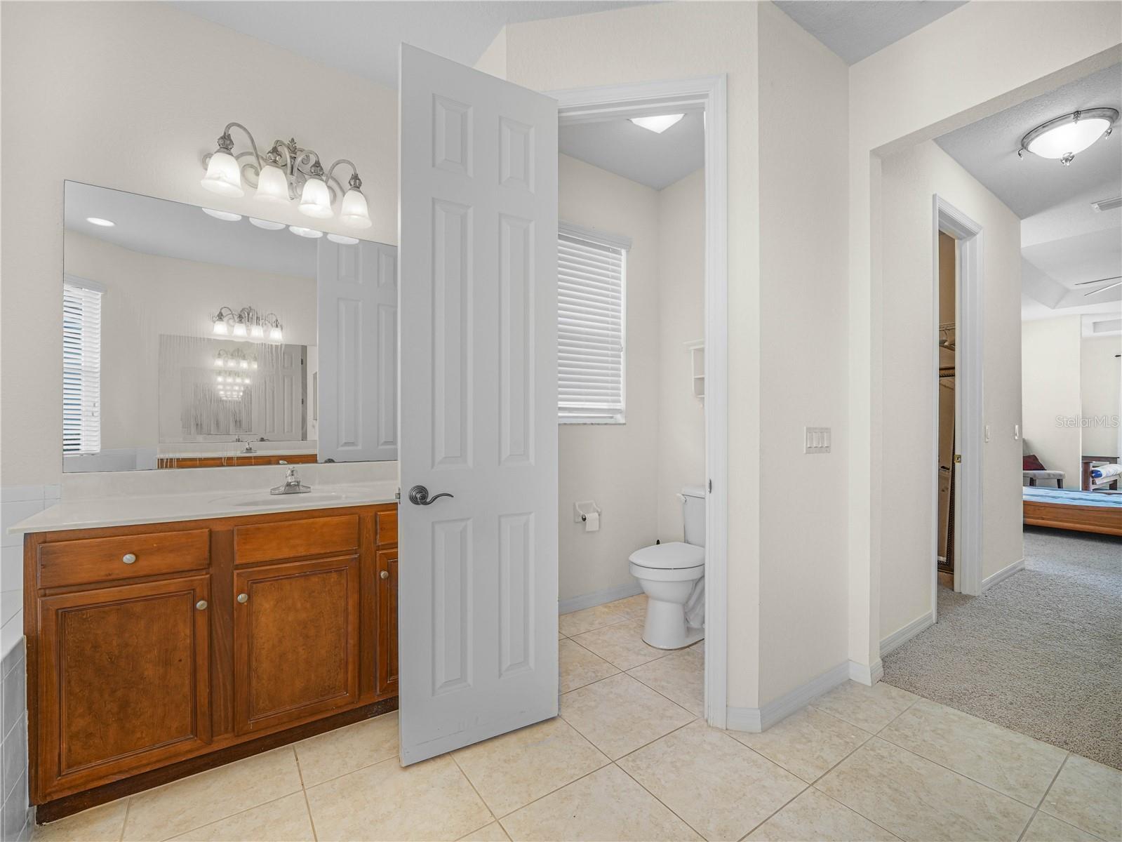 His/Her Vanity and  Private Water Closet - 5264 GREEN DR, WINTER HAVEN