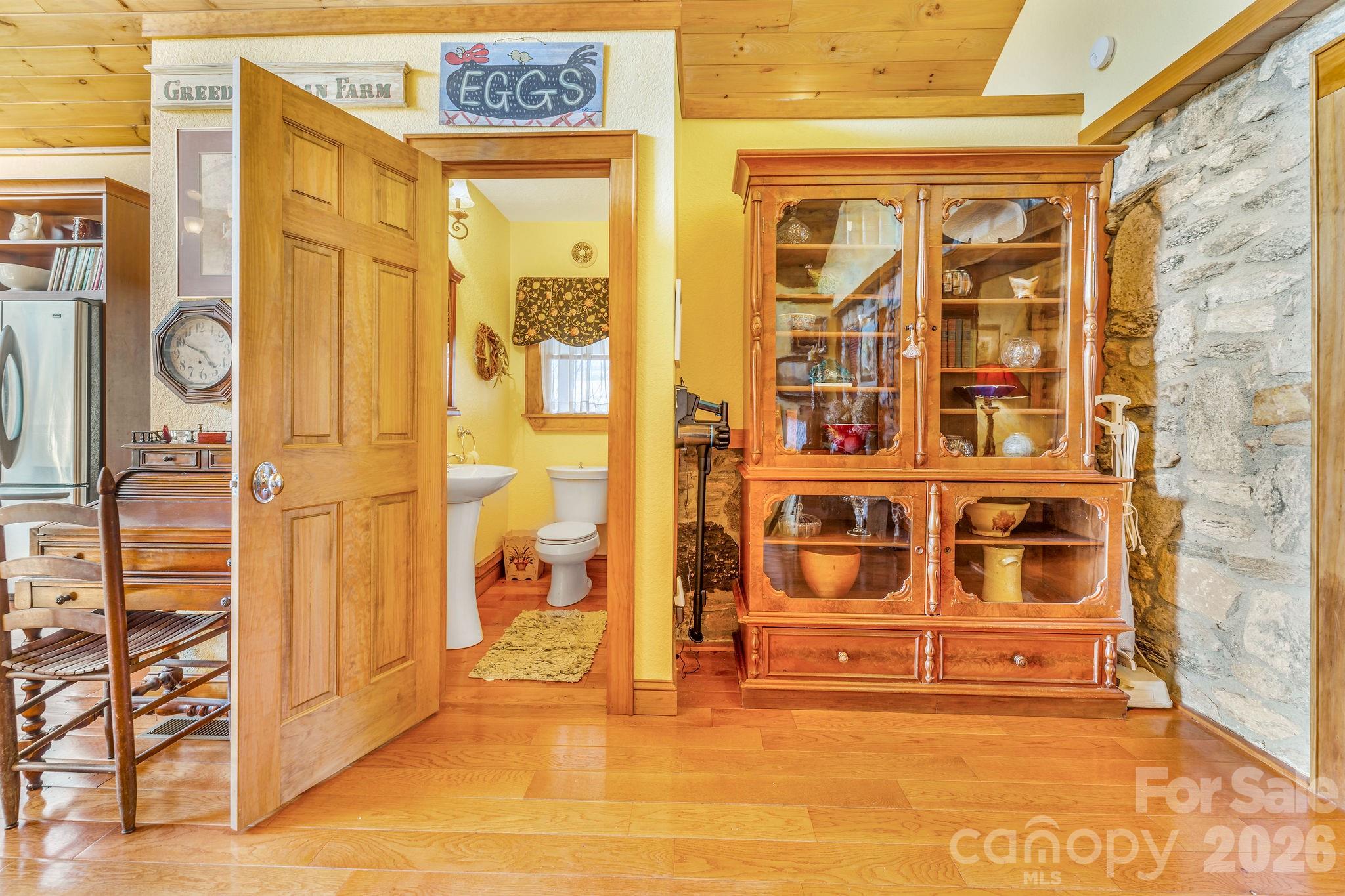 Half bathroom on the main level. - 22 Mountain Spring Lane, Canton
