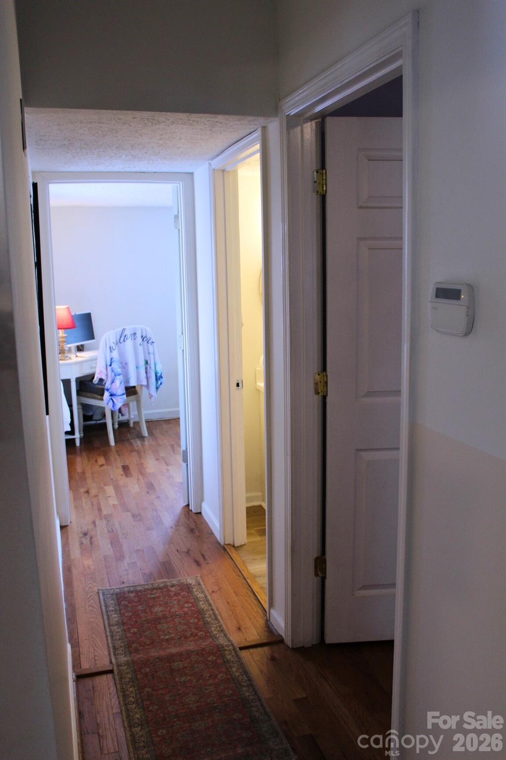 Hallway to both bedrooms and bathroom - 625 Milton Avenue SW, Valdese