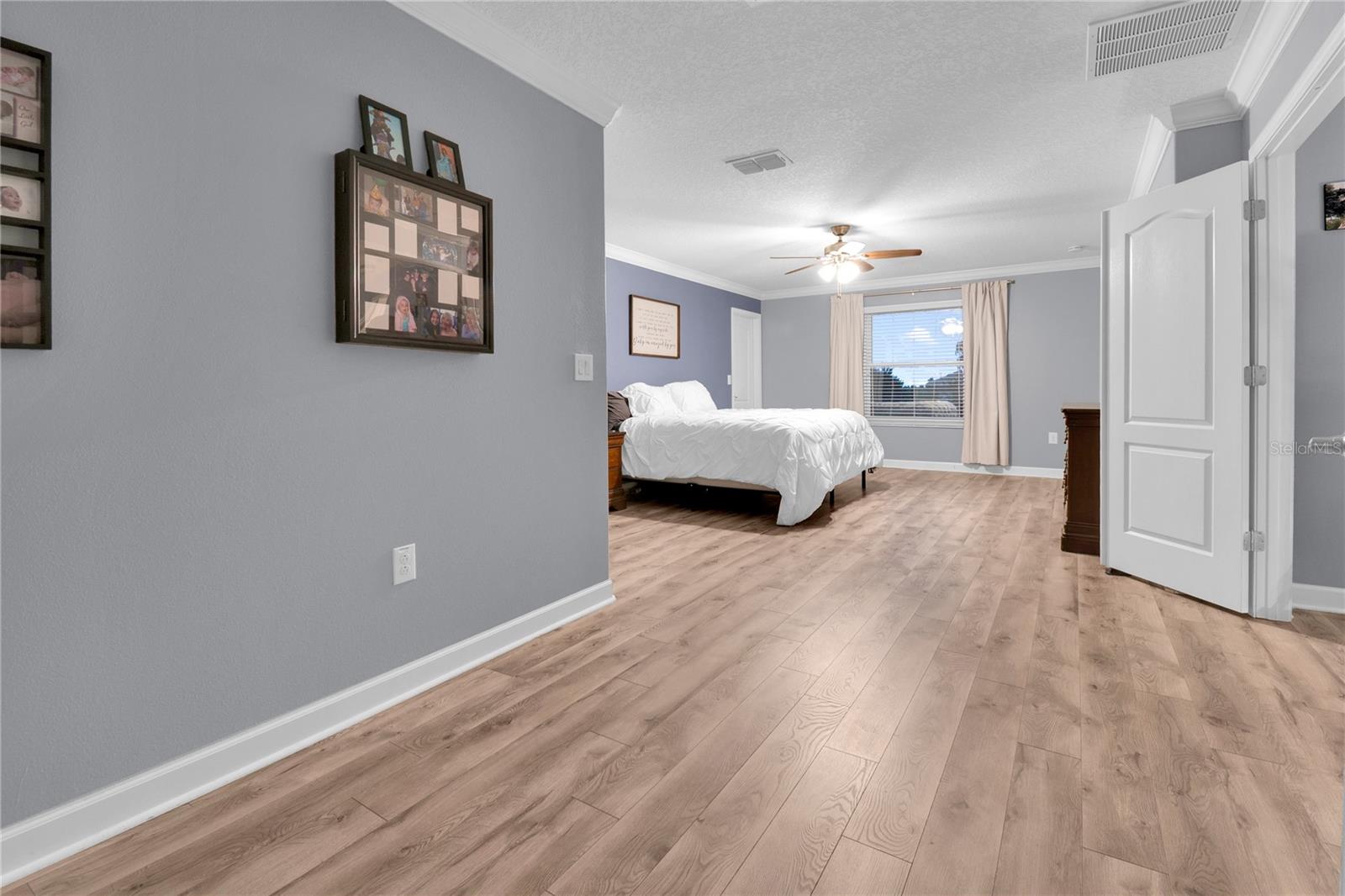 Master Bedroom bonus space can be used for a sitting area, office space, home gym, etc - 1301 GLENEAGLES LN, DAVENPORT