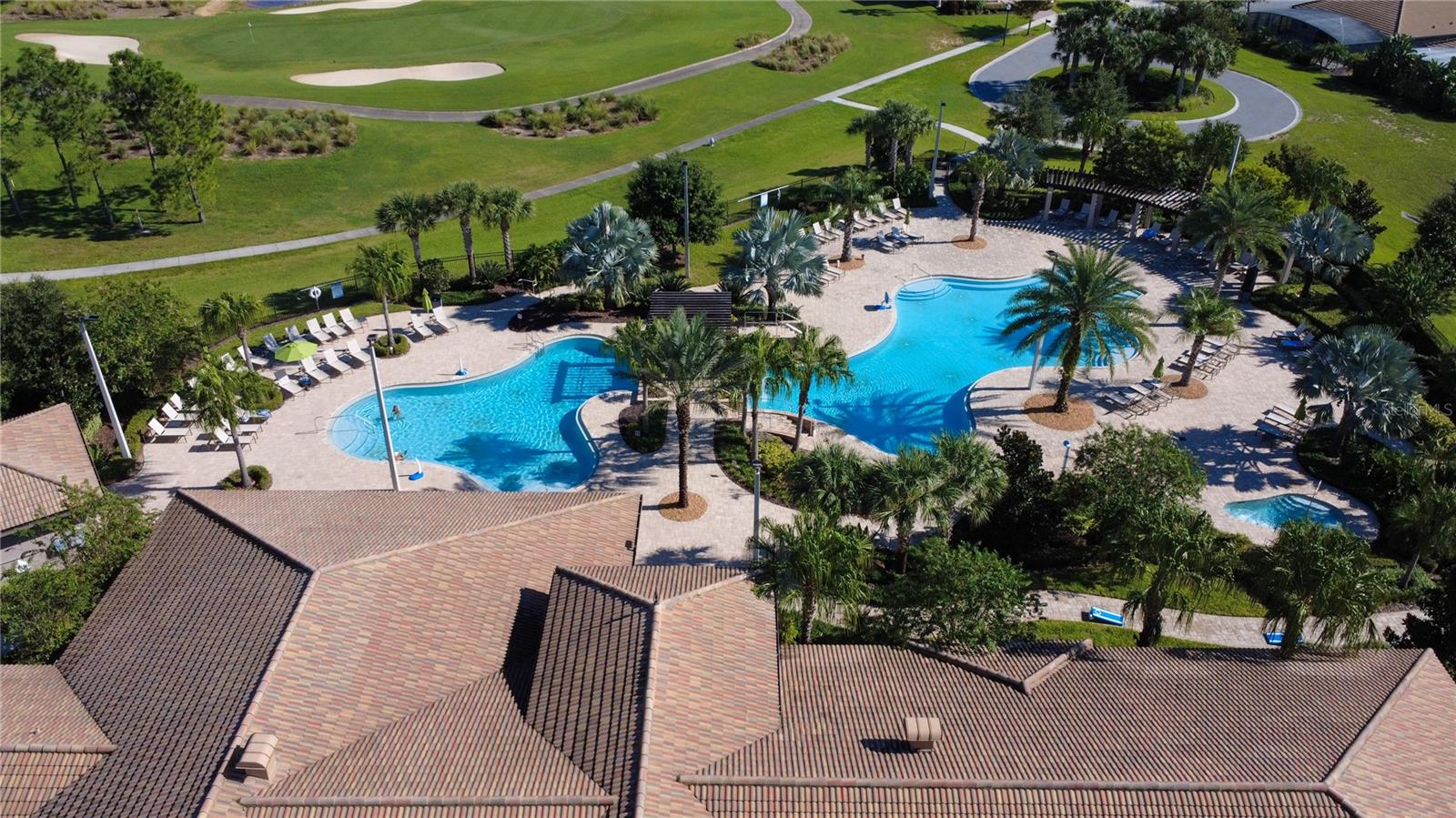 The Plaza has a back gate by the pools that is a very short walk from the home - 1301 GLENEAGLES LN, DAVENPORT