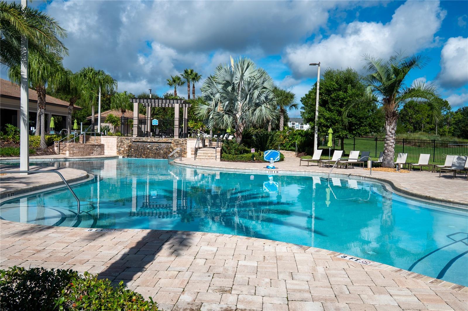 The Plaza - lower pool, waterfall, and loungers - 1301 GLENEAGLES LN, DAVENPORT