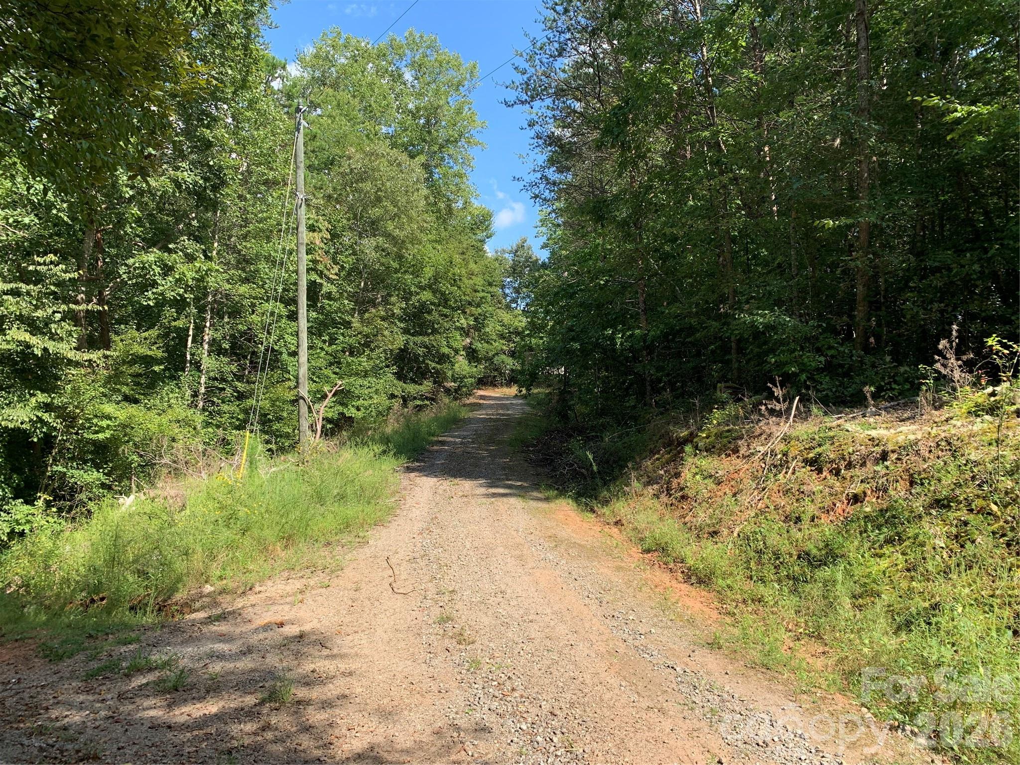 Private road access via recorded easement - 1800 Hilferty Road, Hickory