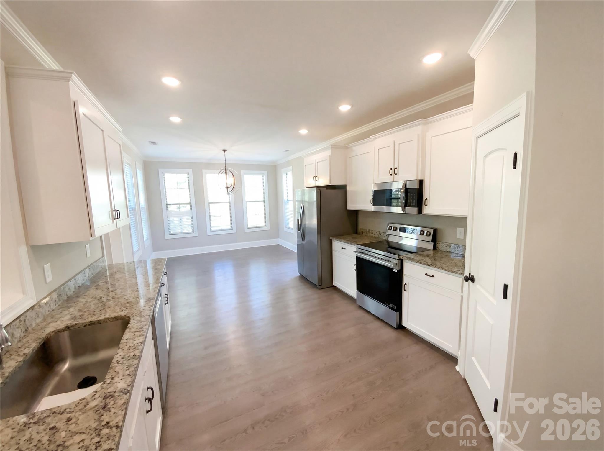 Single Family Residence at 429 Old Speedway Drive NW, Concord, photo 2 of 14
