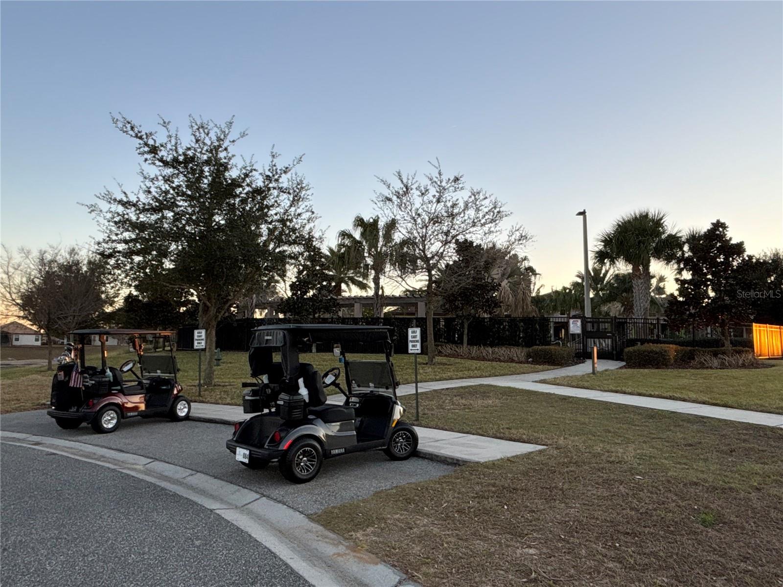 Golf cart only parking at the back entrance of The Plaza - 1301 GLENEAGLES LN, DAVENPORT