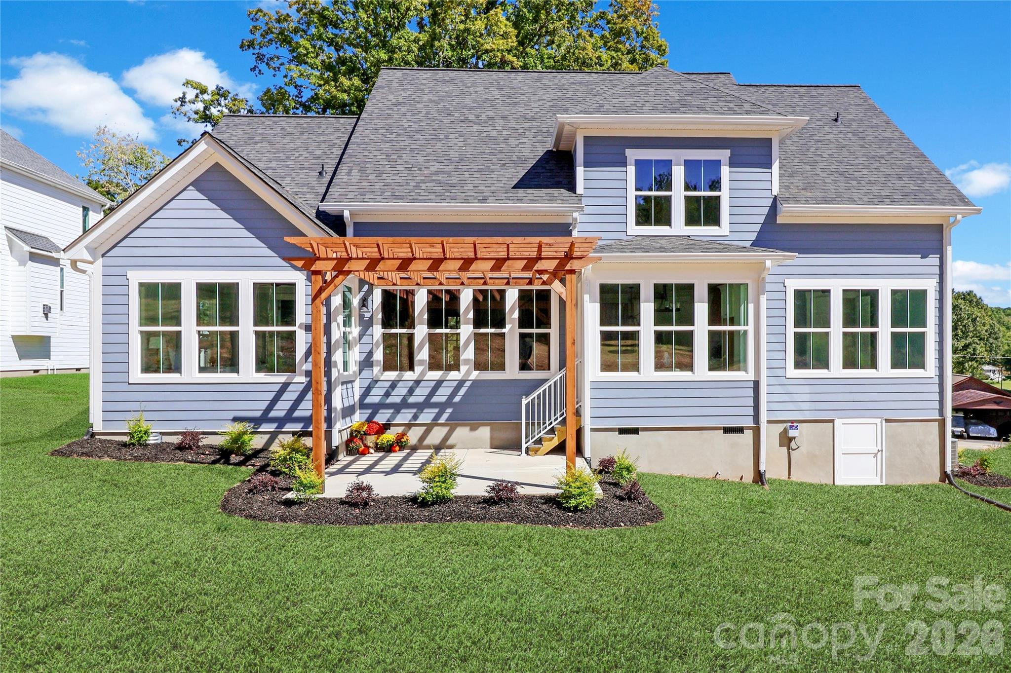 The attention to detail in the exterior design of this beautiful home reflects a commitment to quality and style. - 4265 Candlewood Drive, Sherrills Ford