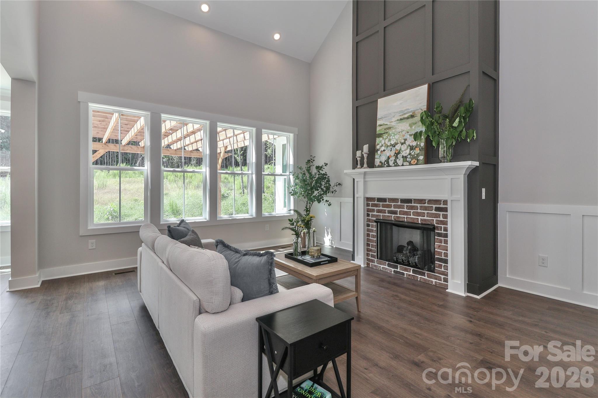 The stunning and cozy gas fireplace anchors the living room with warmth and elegance. - 4265 Candlewood Drive, Sherrills Ford
