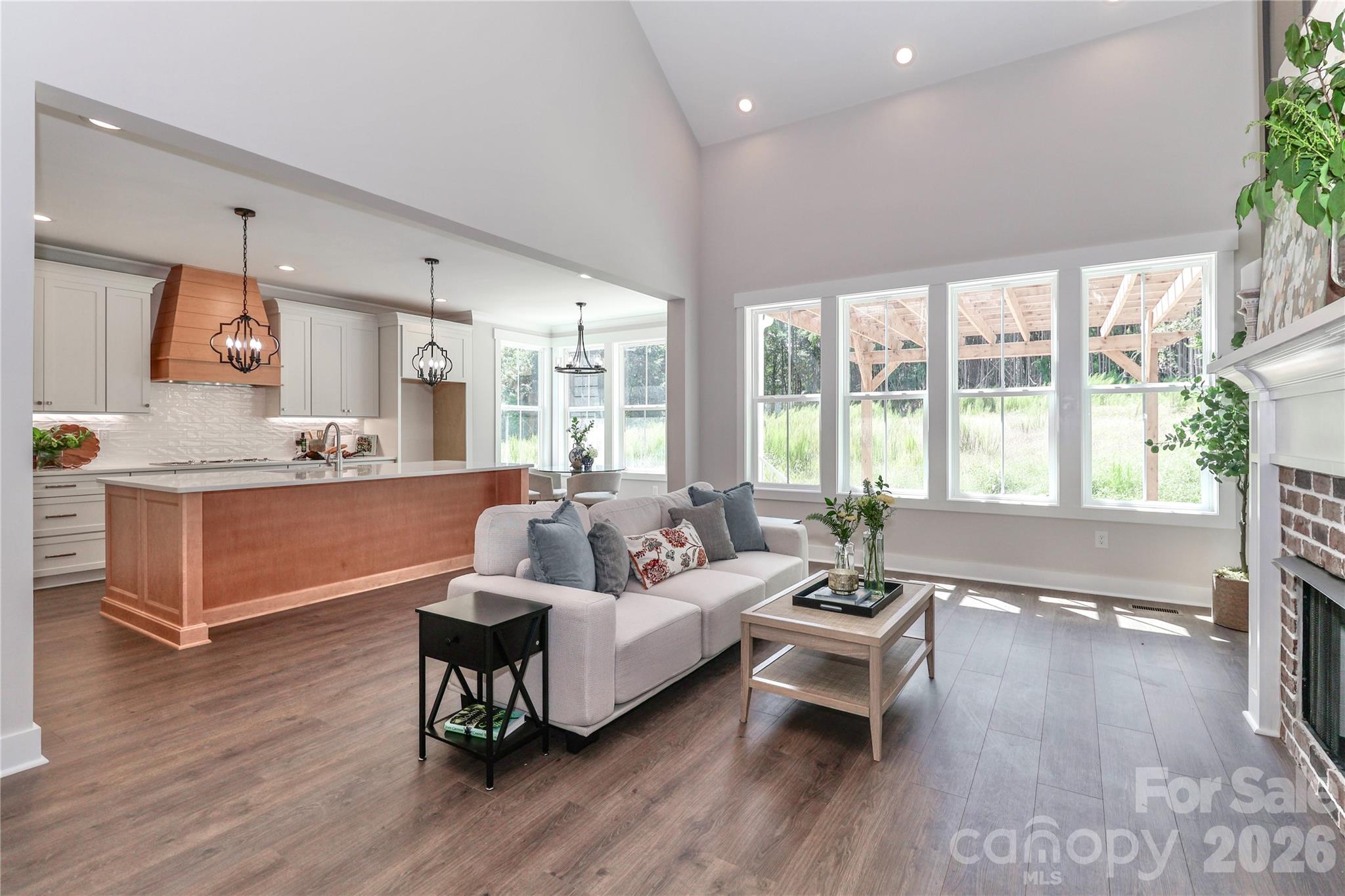 Seamlessly flow from the living room to kitchen. - 4265 Candlewood Drive, Sherrills Ford