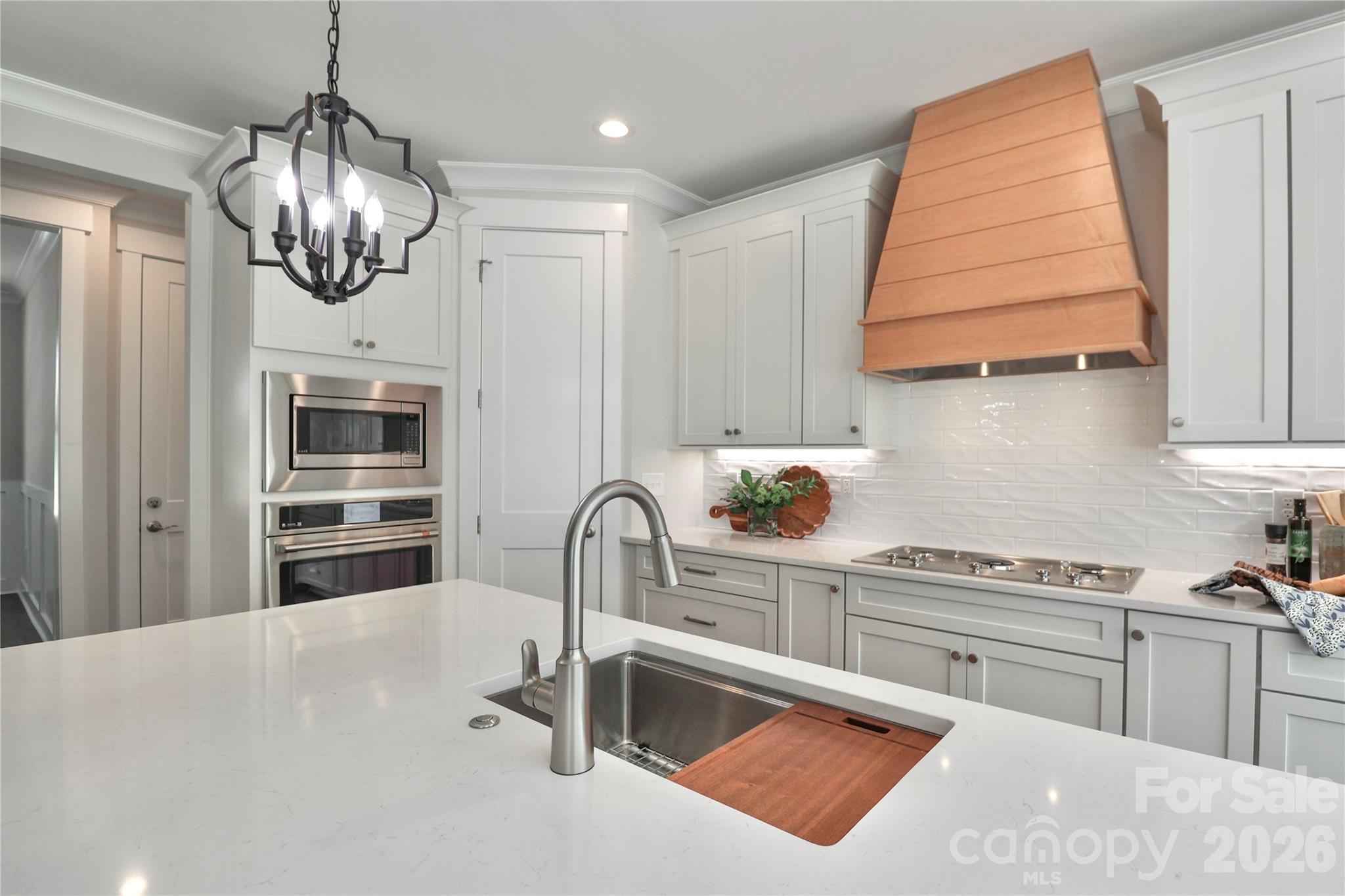Featuring stainless steel appliances with custom cabinetry. - 4265 Candlewood Drive, Sherrills Ford