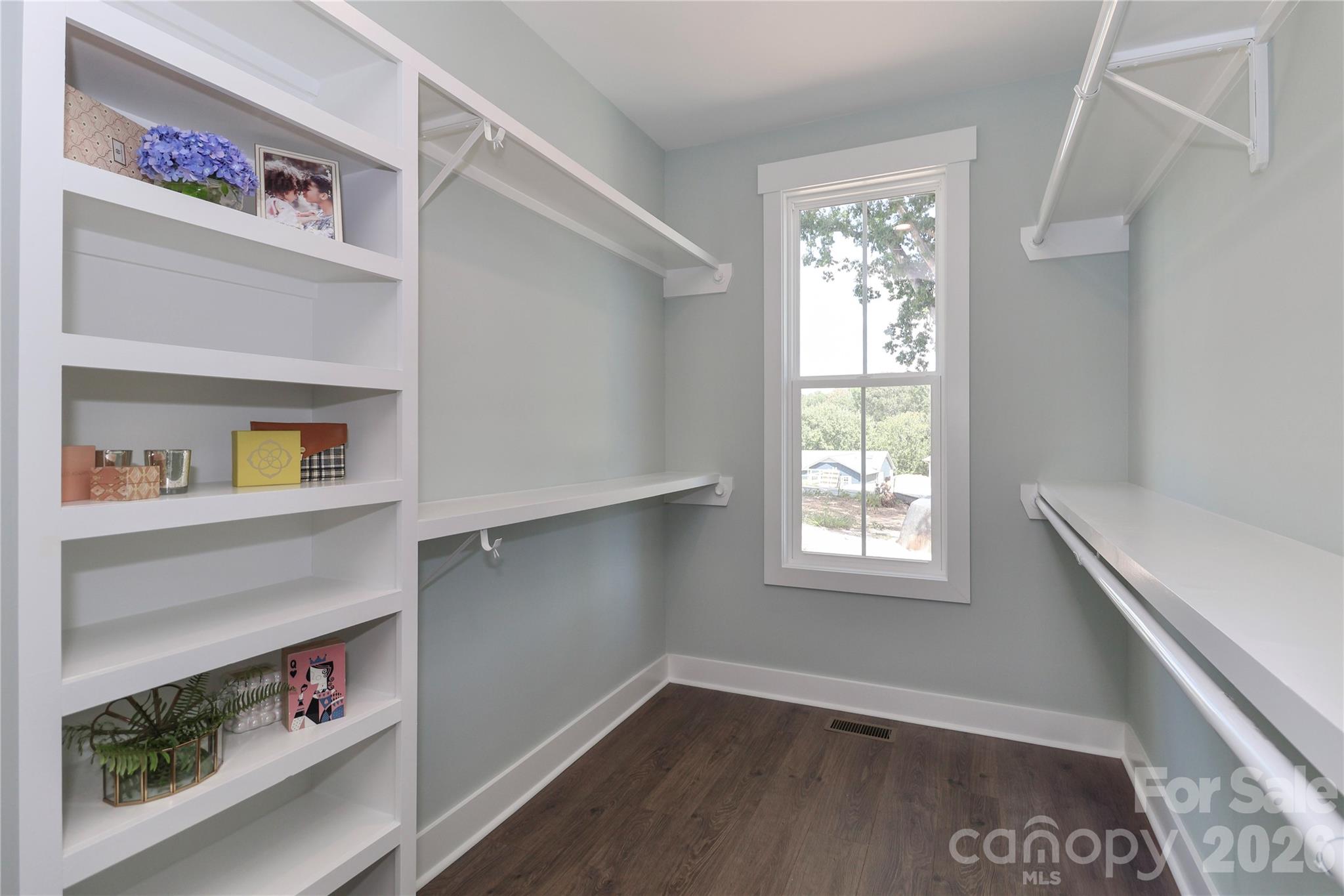 With an oversized walk-in primary closet, organization and storage spaces are abundant. - 4265 Candlewood Drive, Sherrills Ford