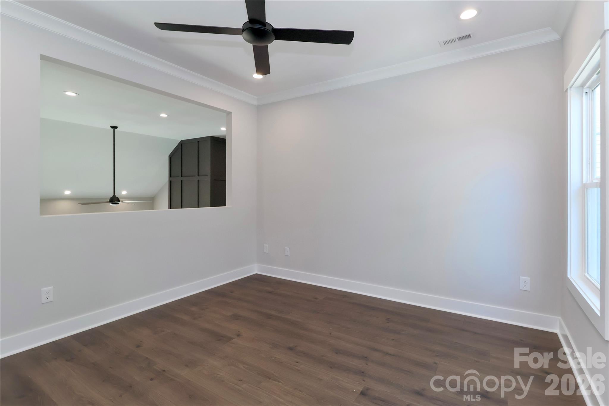 This expansive loft provides a blank slate for imaginative designs and adaptable spaces. - 4265 Candlewood Drive, Sherrills Ford