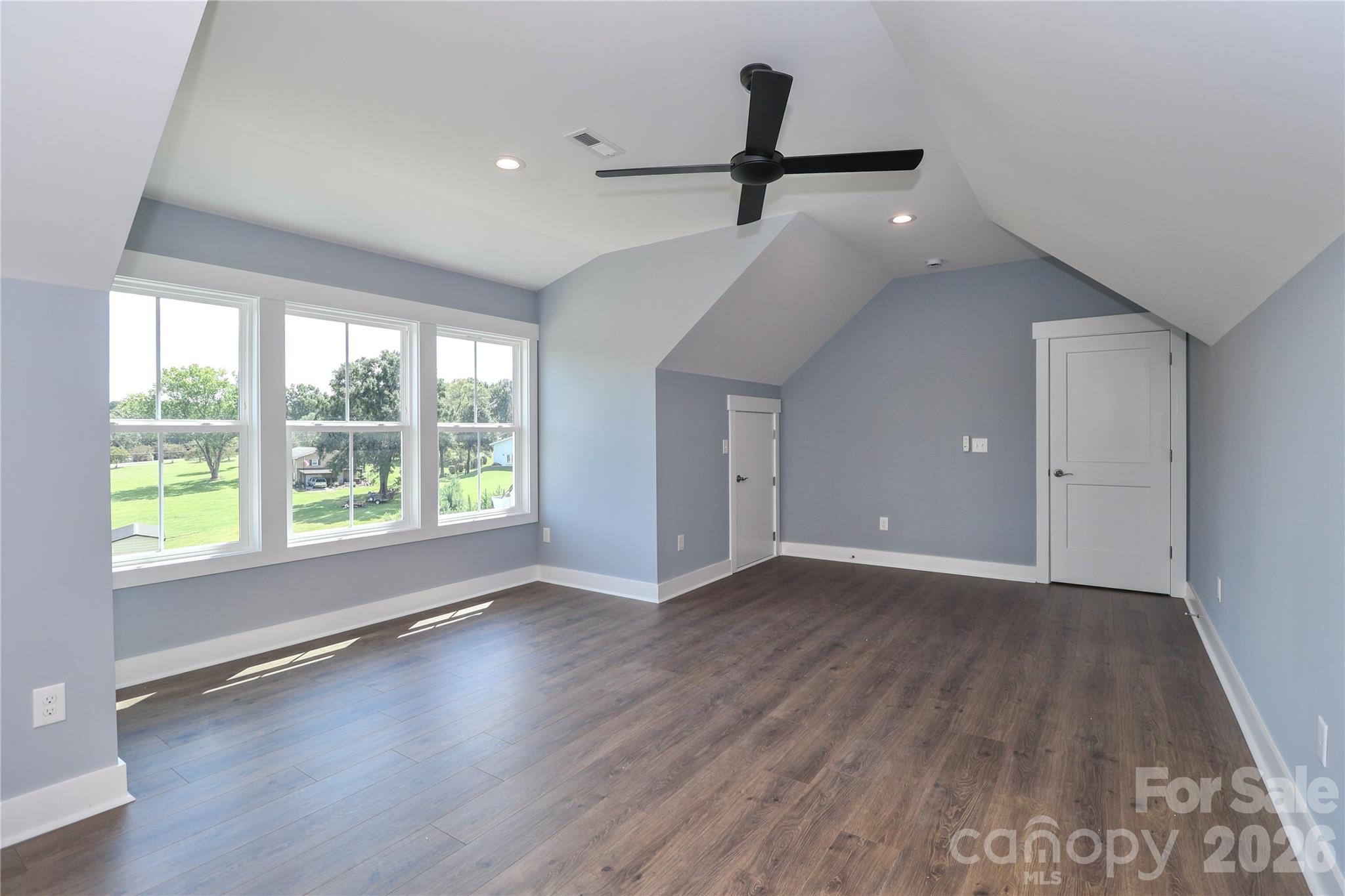 a generously sized bonus room, providing homeowners with a versatile space that can be adapted to meet a wide array of needs and interests. - 4265 Candlewood Drive, Sherrills Ford