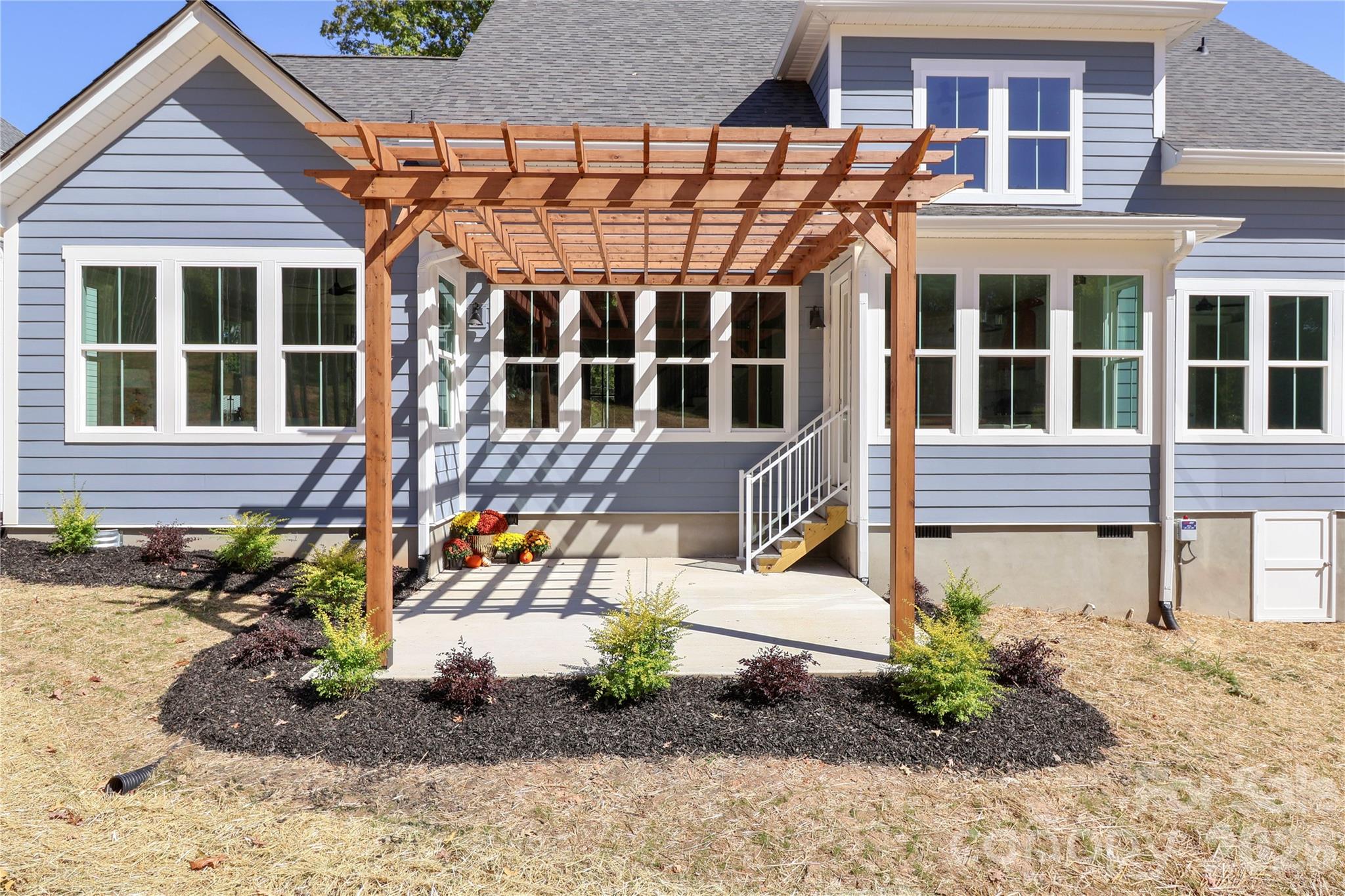 This structure provides a tranquil setting for relaxation and social gatherings, transforming your backyard into an inviting extension of your living area. - 4265 Candlewood Drive, Sherrills Ford