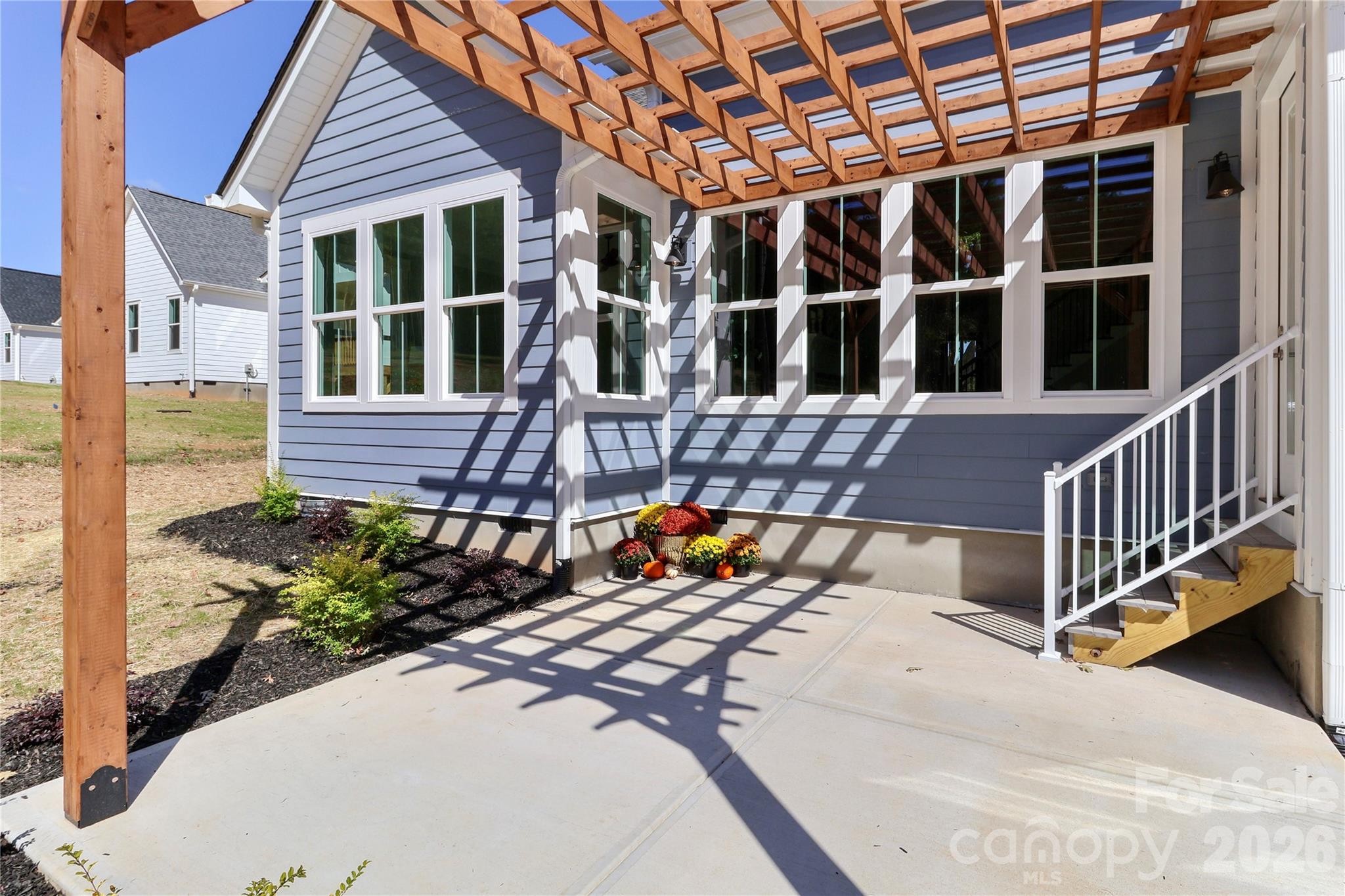 Designed to enhance outdoor living, offering a comfortable and versatile space for all seasons. The thoughtful design prioritizes both functionality and aesthetic appeal. - 4265 Candlewood Drive, Sherrills Ford