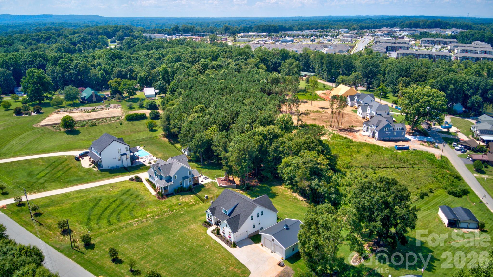 This beautiful home is perfectly situated in a desirable neighborhood, surrounded by stately custom-built properties, showcasing the area's unique character and attention to detail. - 4265 Candlewood Drive, Sherrills Ford