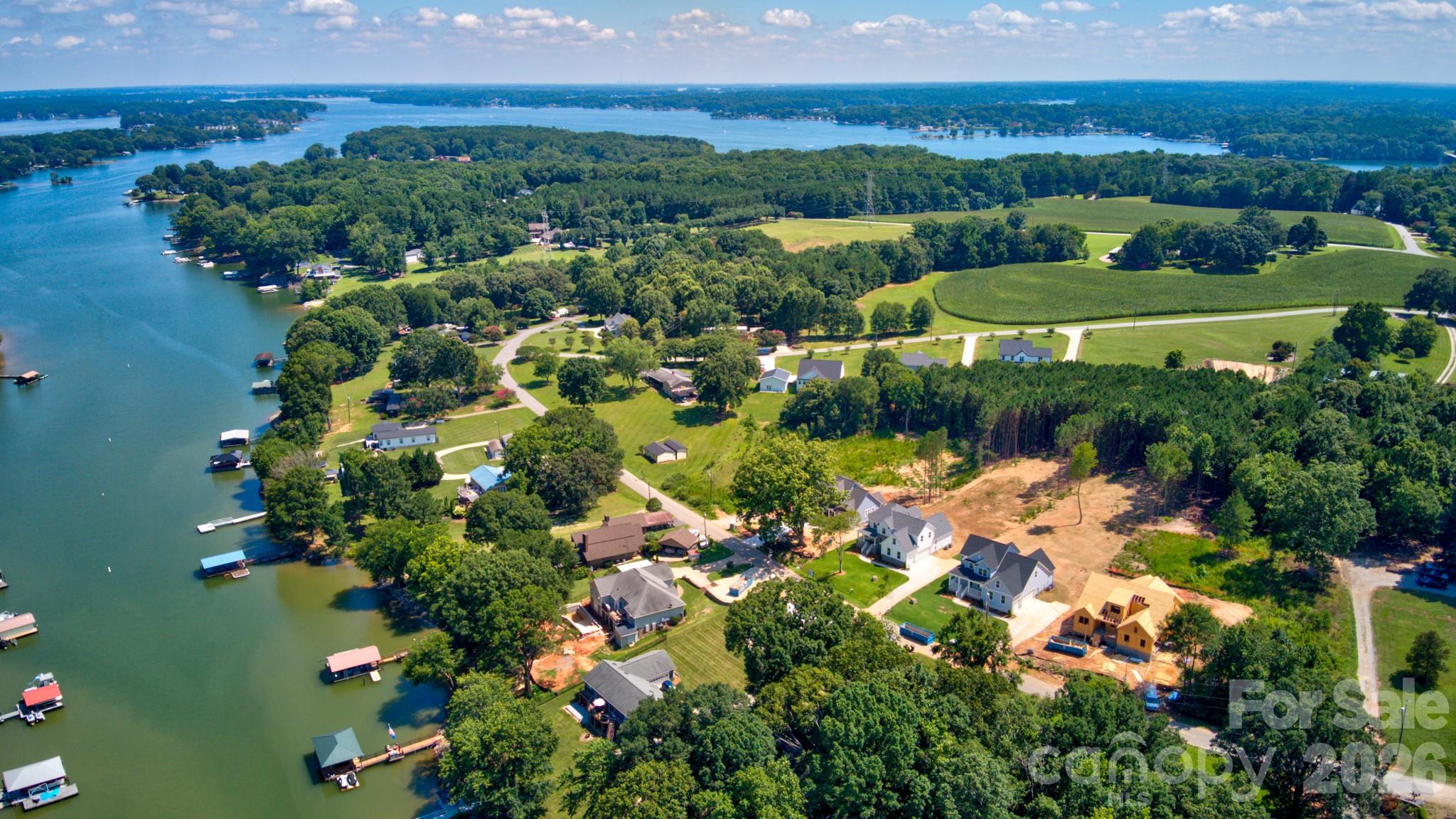 Enjoy effortless lakeside adventures with the community lake access conveniently situated just across the street. - 4265 Candlewood Drive, Sherrills Ford