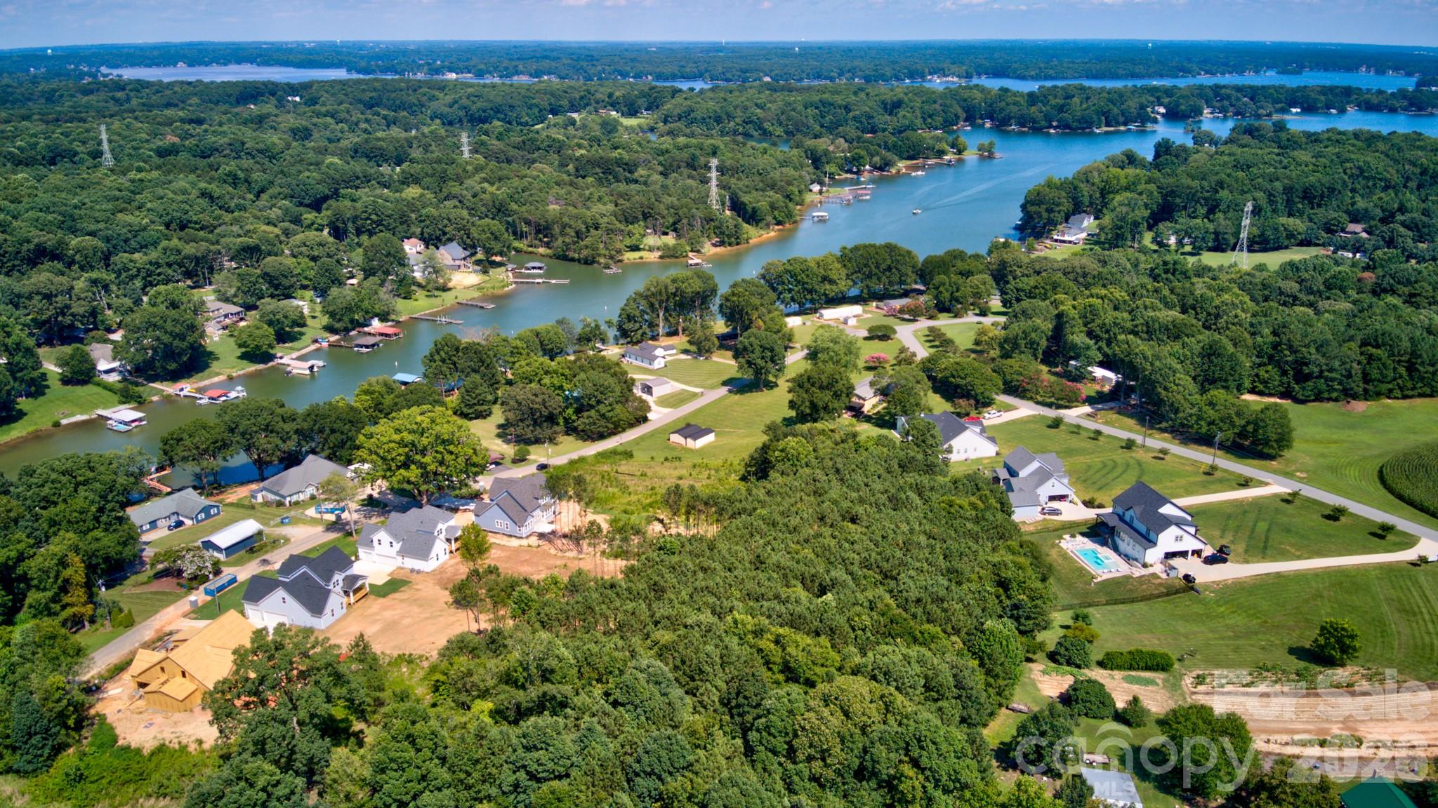 Perfectly situated in a serene setting, this property is exceptionally well-located, placing you just minutes away from an array of shopping and dining establishments. - 4265 Candlewood Drive, Sherrills Ford