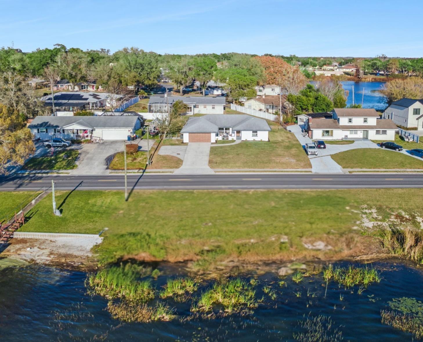 Welcome to a lakefront home with lake access - 1106 LAKE ARIANA BLVD, AUBURNDALE