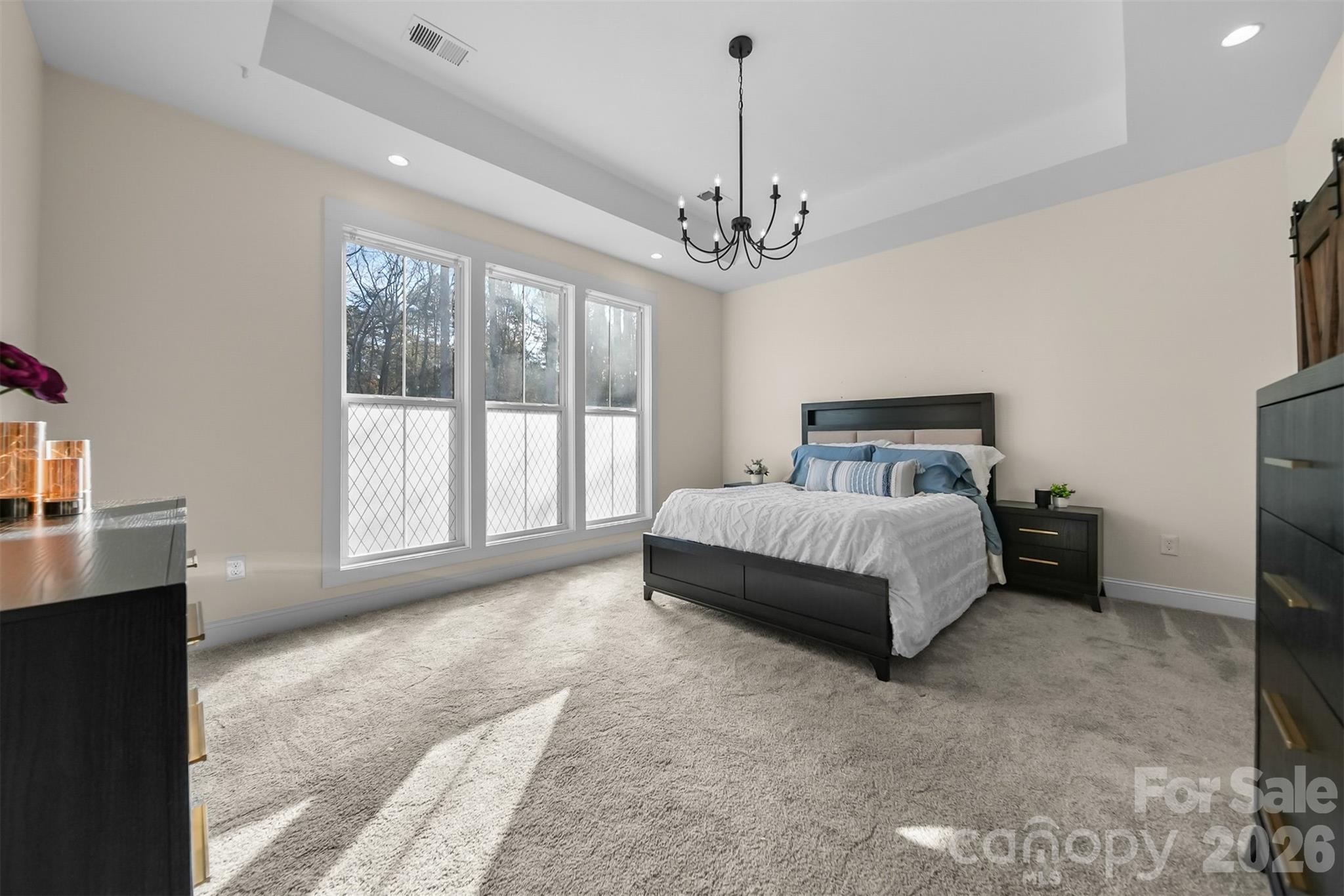 Spacious Primary Bedroom with views of the large backyard - 2586 Lee Lawing Road, Lincolnton